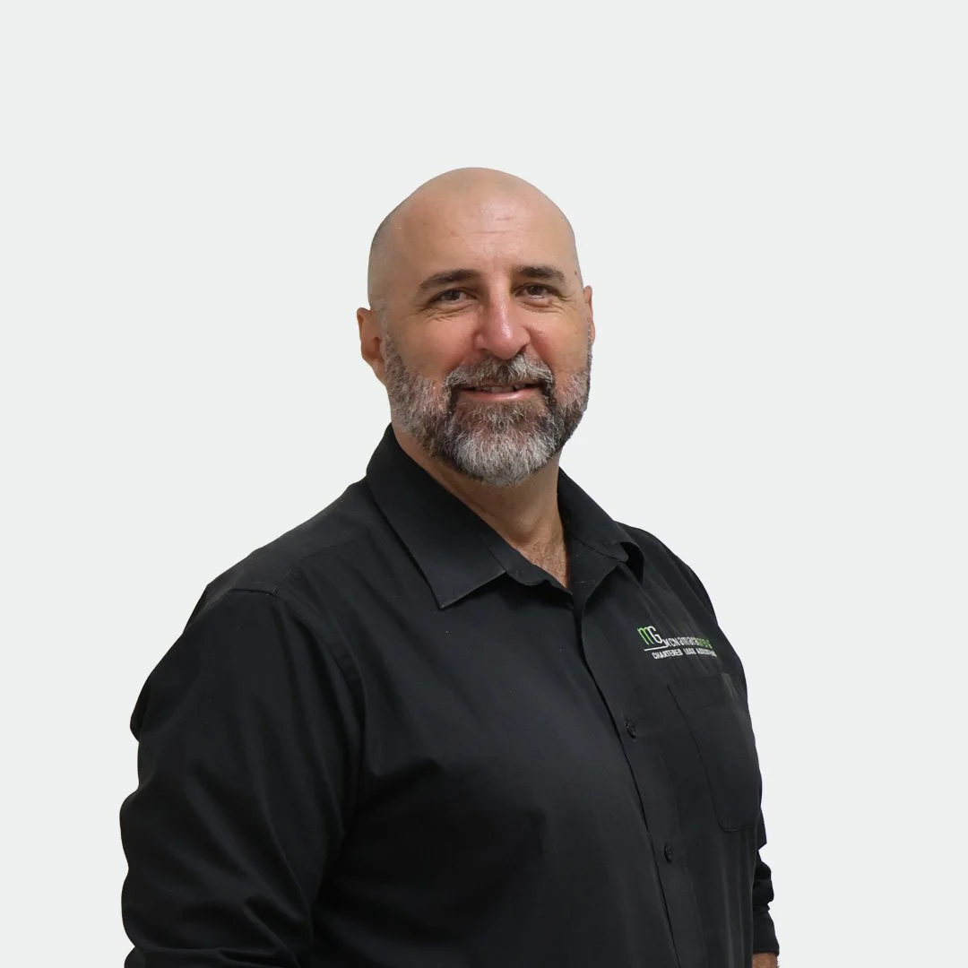 Silhouette of a person's head and shoulders on a gray circular background.