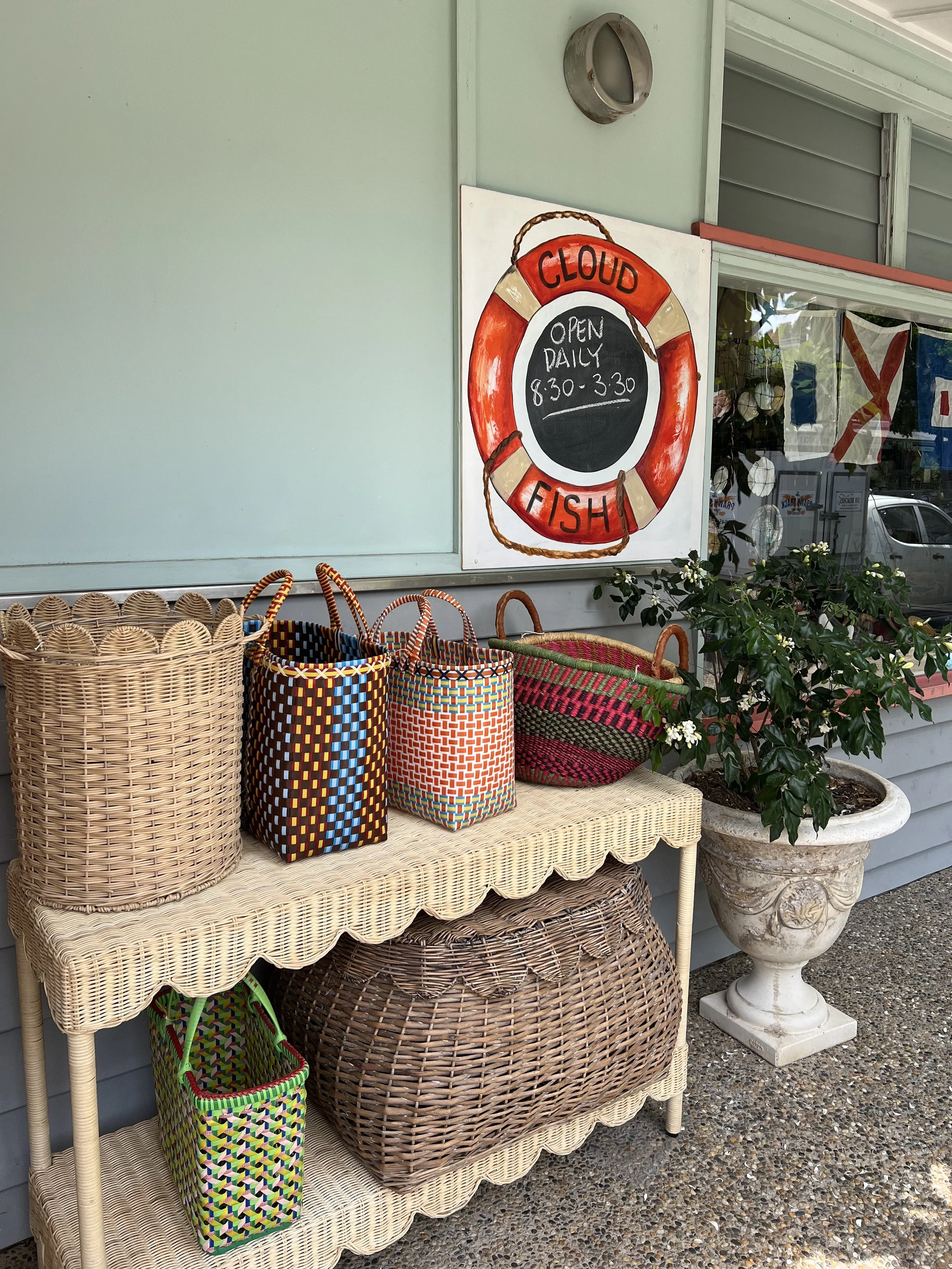 Baskets displayed in front of cloud fish gallery stradbroke island