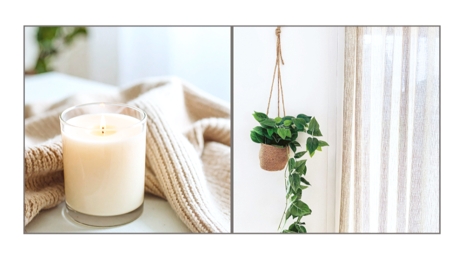 A lit white candle on a tray with a beige knitted blanket and a hanging potted plant with green leaves near a window with sheer curtains.