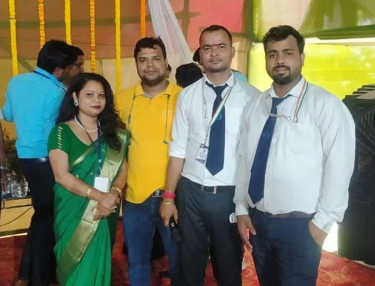 Renu with staff.jpeg