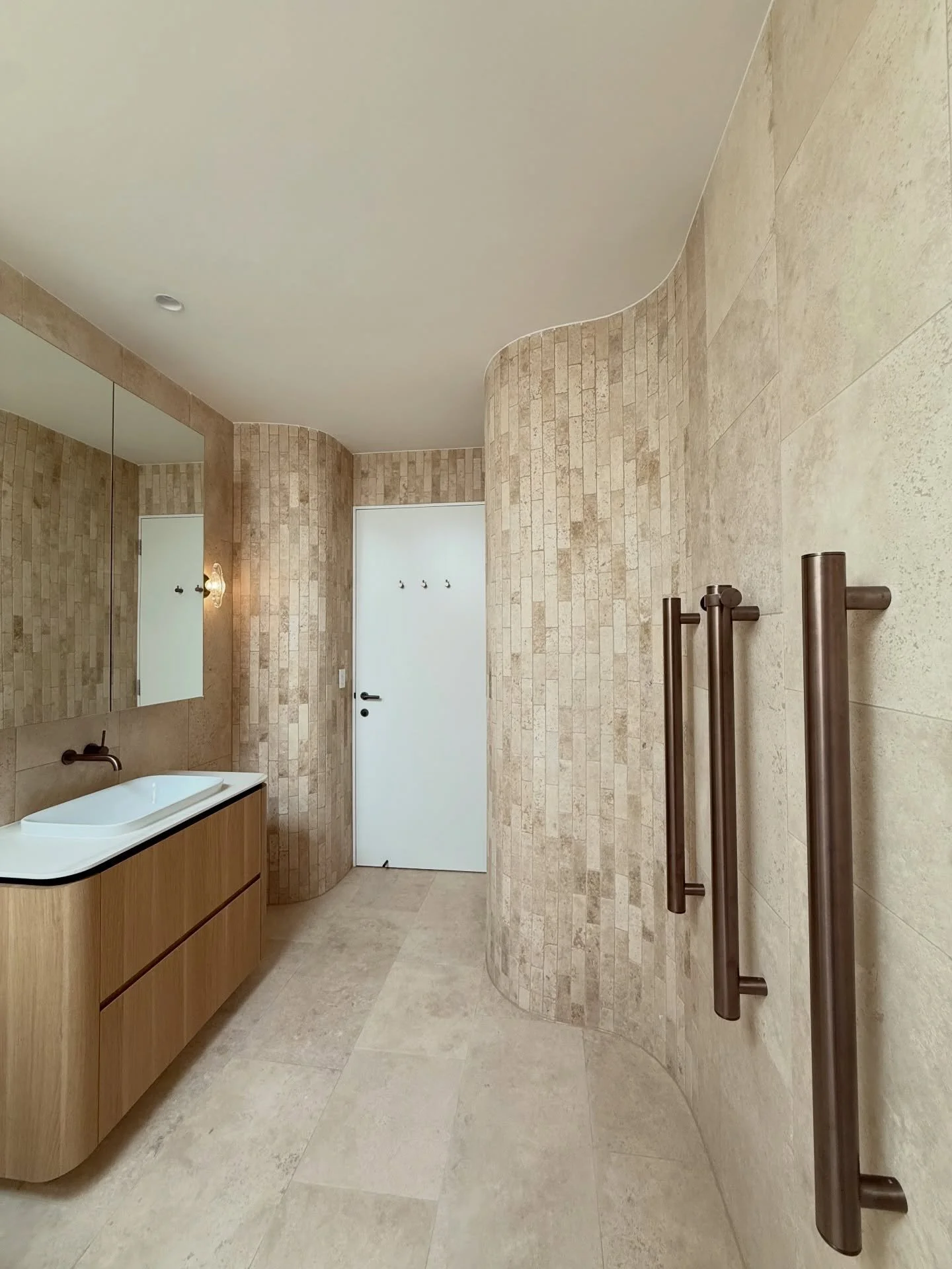 Our Rose Bay project included three generous ensuites. Each bathroom used the same small-format tiles for consistency, while variations in layout and subtle detailing gave each space its own character.