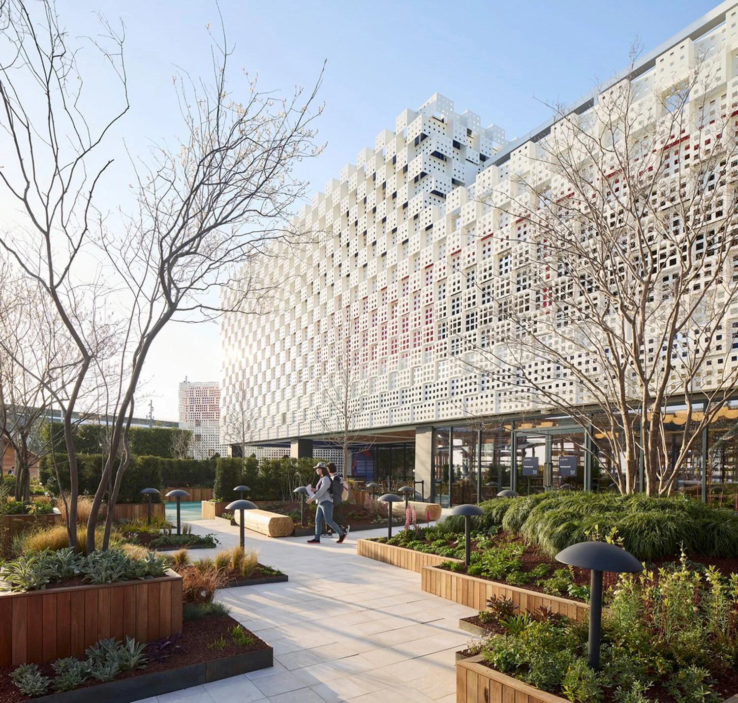 Osaka Pavilion with a geometric facade and landscaped garden