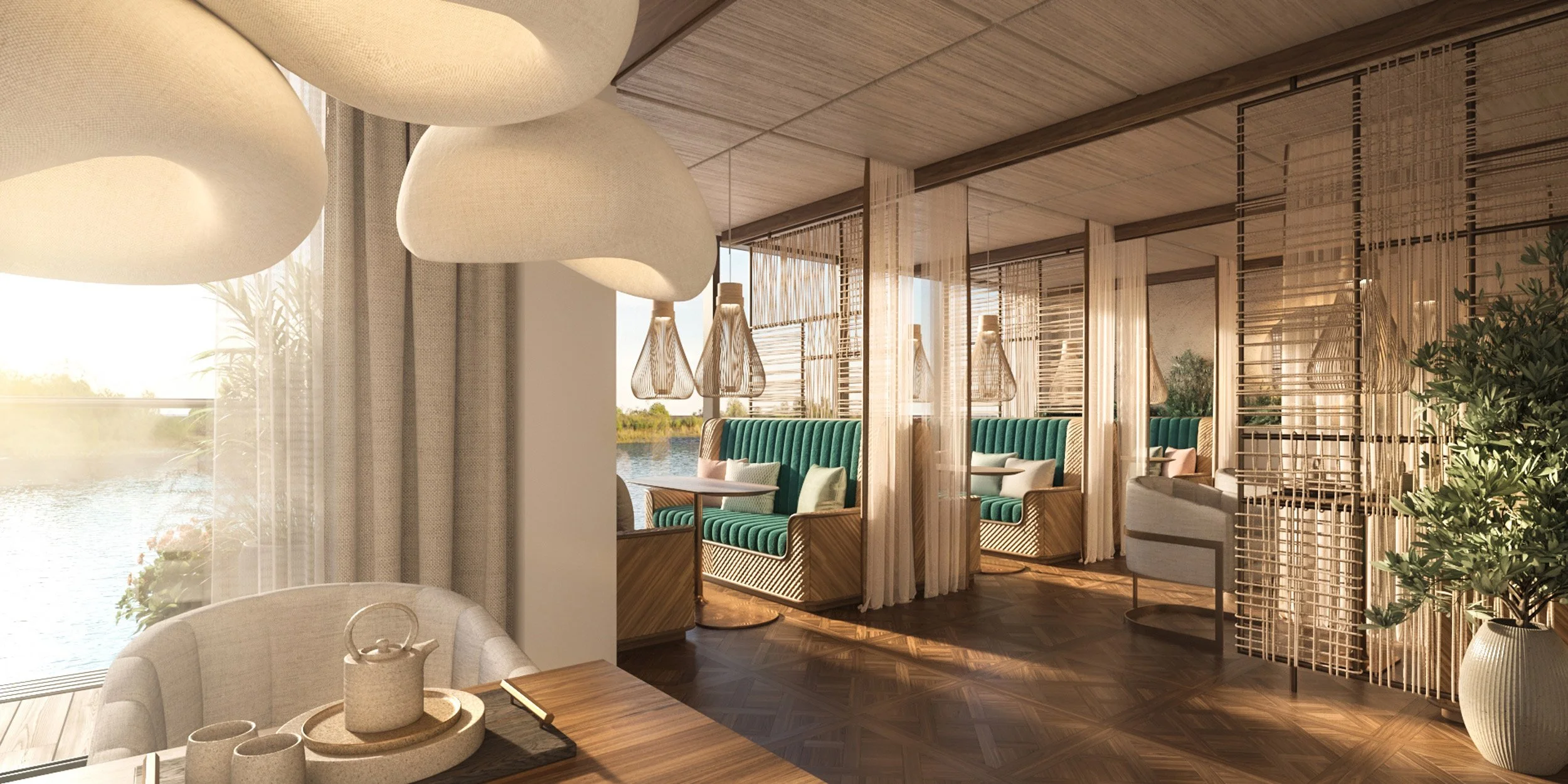 Riverside Spa at Fulham Football Club with wooden decor, teal seating, hanging lights, and large windows overlooking water.