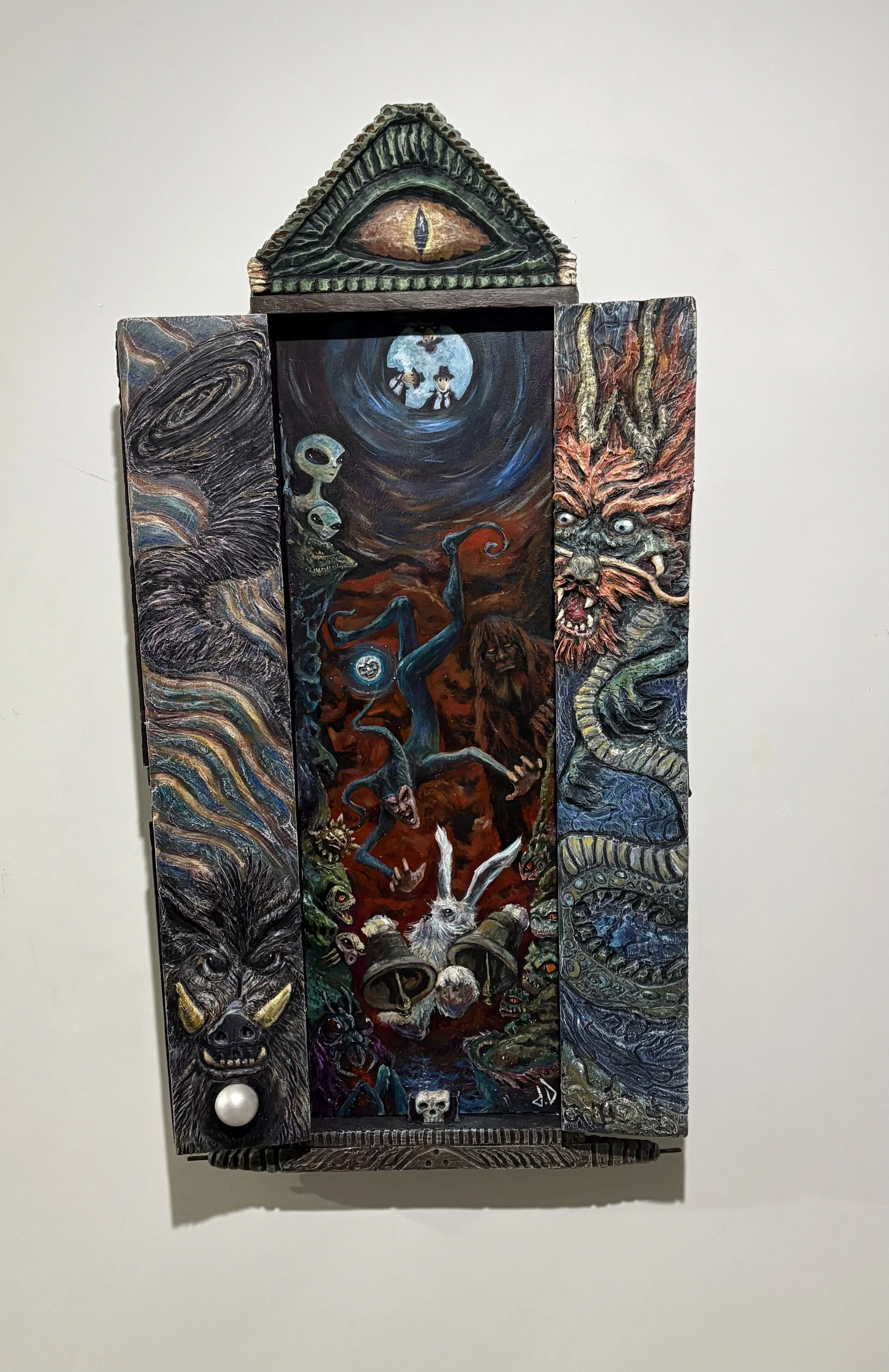 Title: For this Rabbit Hole Bring the Bells 
open Triptych
For those of us who spend time down rabbit holes rarely open up with it.  This can feel like casting pearls before swine in some company. This is why I have A boar and Dragon Pearl on the ins