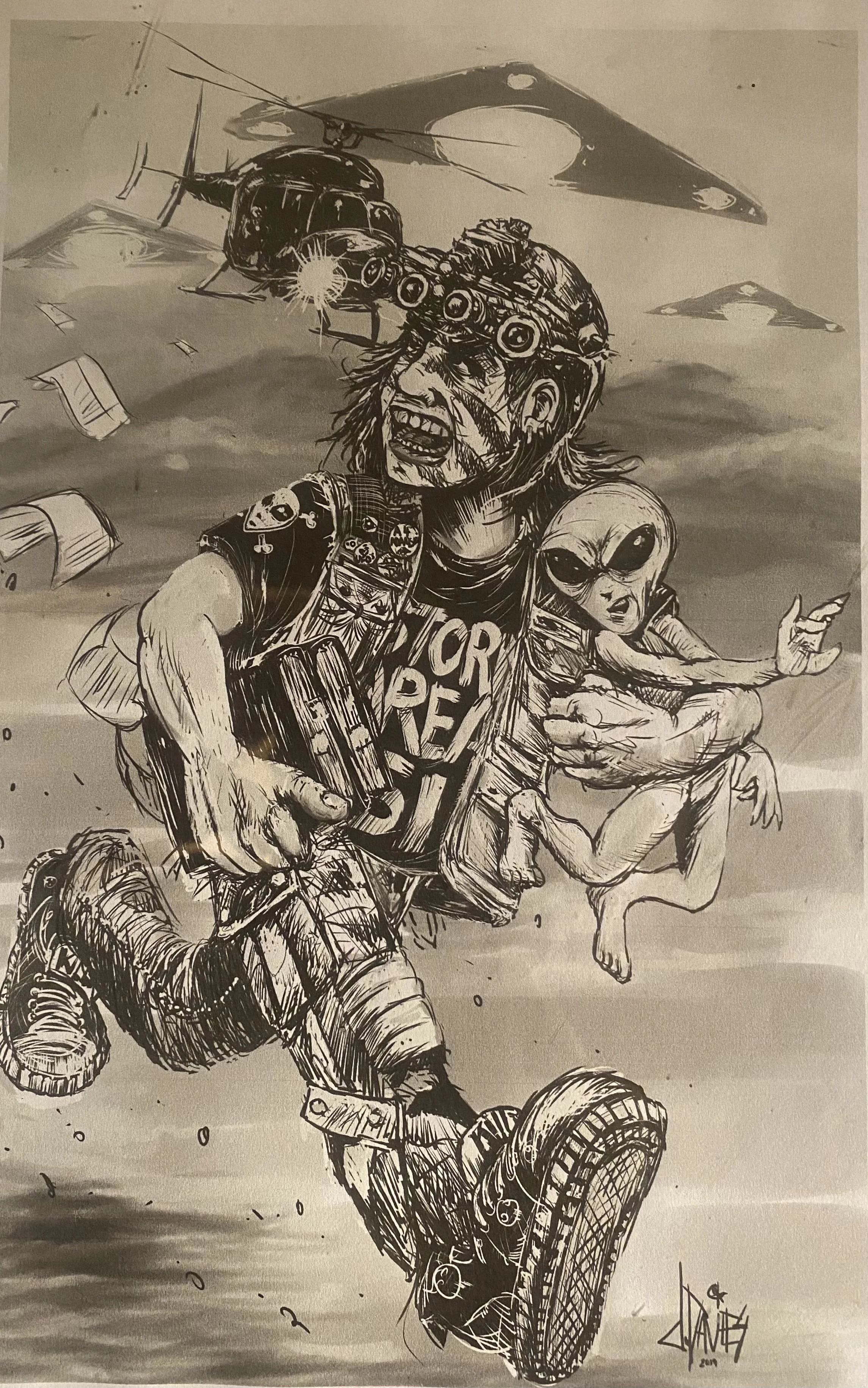 Pen and ink drawing I made during the Storm area 51 Hype.  This one guy pulled it off. 