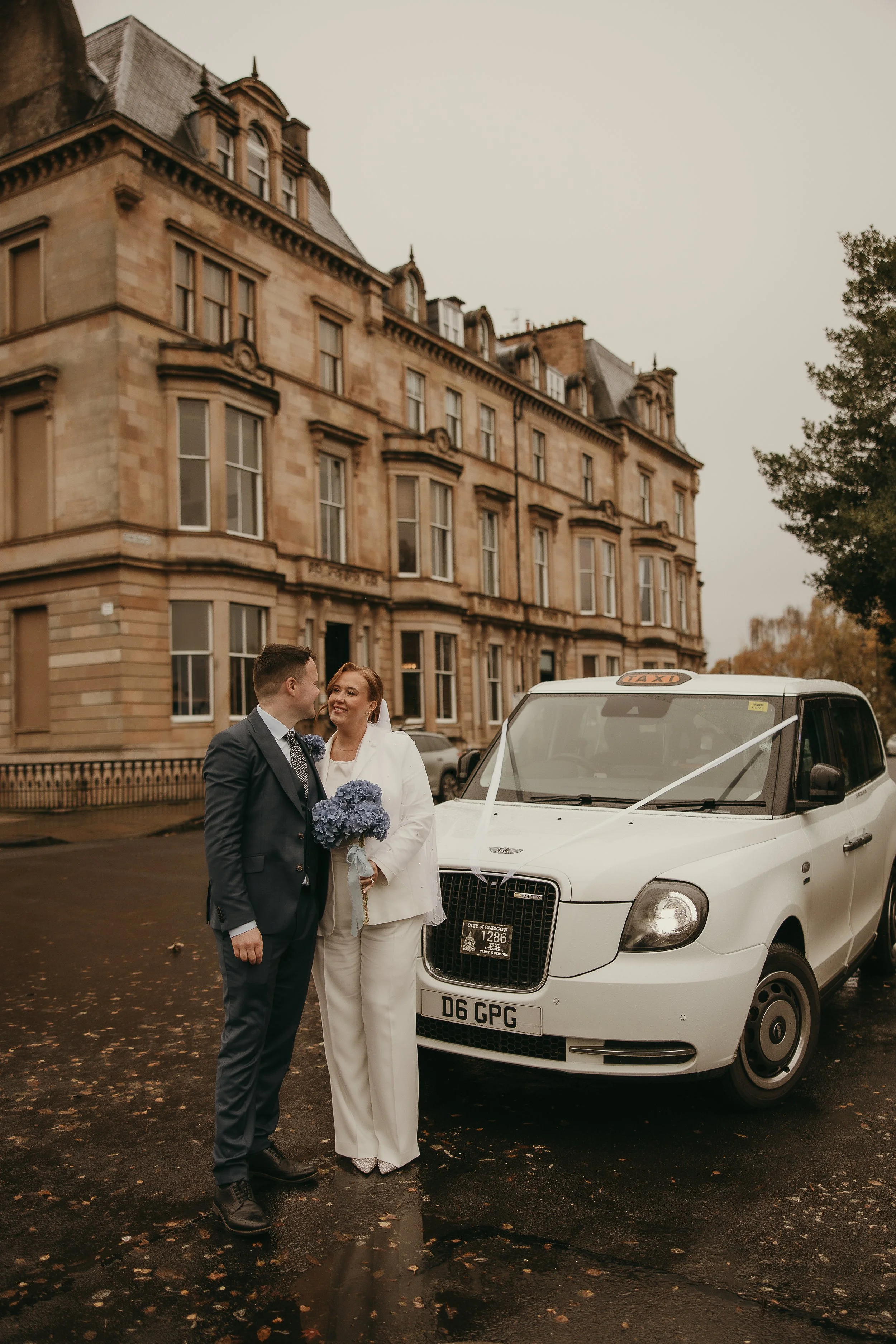 Romantic couple portraits in Glasgow city centre after City Chambers wedding