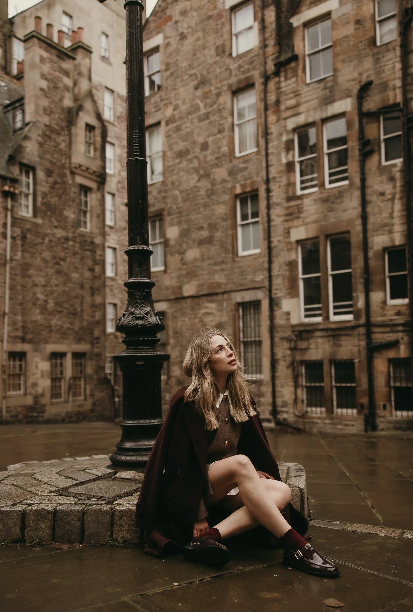 Girl exploring Edinburgh Old Town during a cinematic solo portrait session in Scotland.