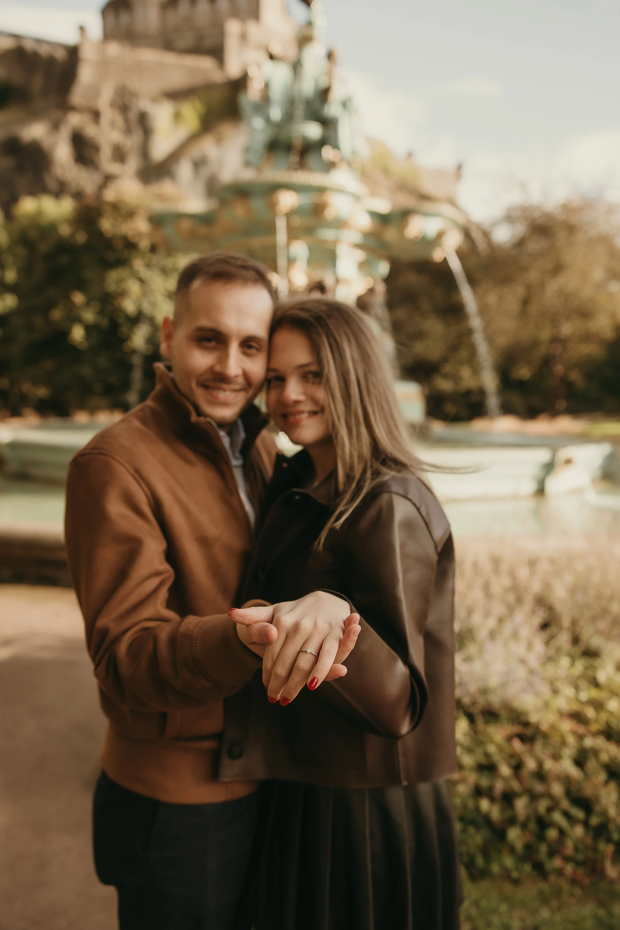 Natural engagement photos in Edinburgh with joyful reaction after proposal