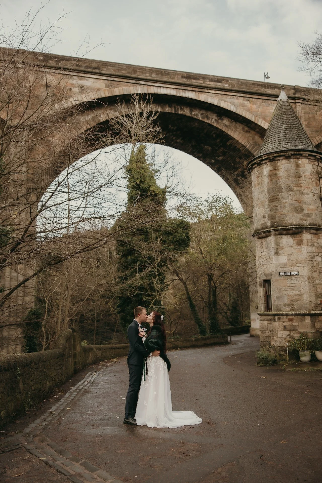 Intimate bride and groom hug captured by an Edinburgh wedding photographer