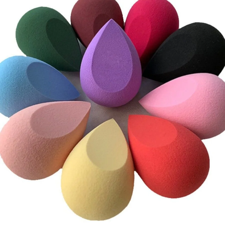 A ring of teardrop-shaped makeup sponges in a dozen colours.