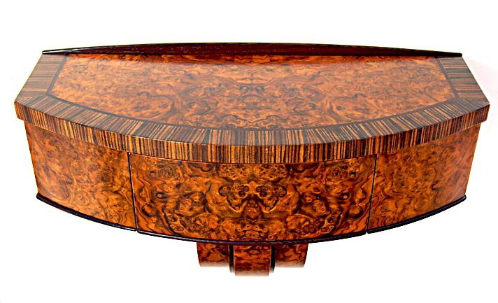 A vintage wooden sideboard with a marbled veneer finish and curved doors.