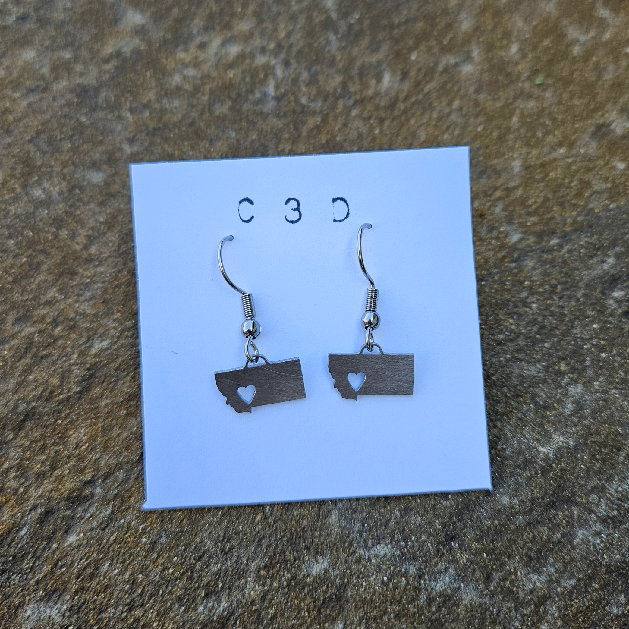 100% stainless steel Montana earrings with heart design.