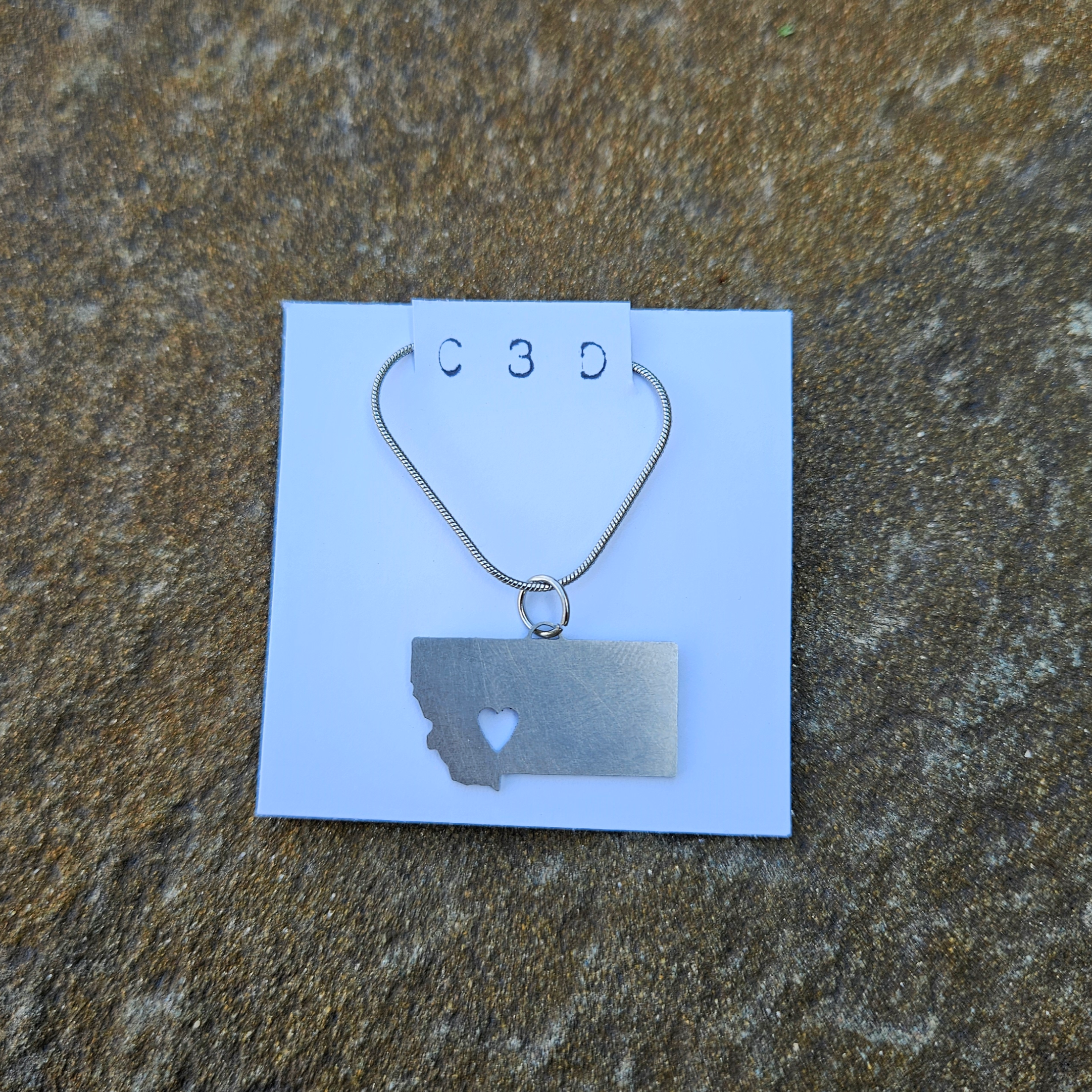 100% stainless steel Montana necklace with heart design.