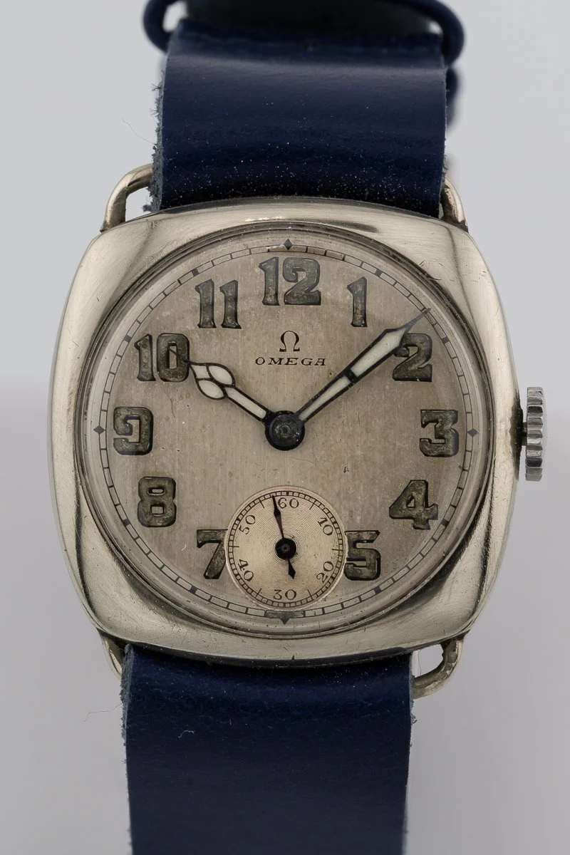 Omega c. 1927 26.5 Nickel Silver Cushion Case Manual