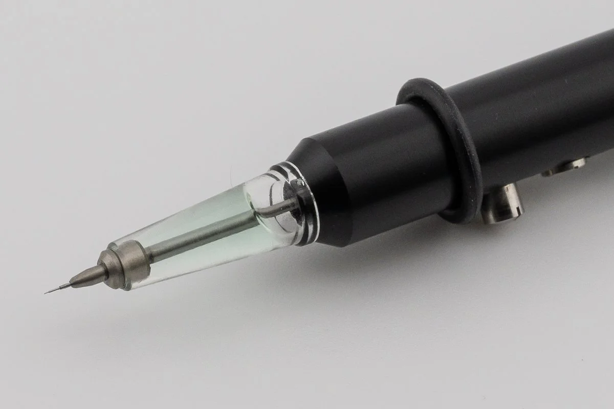 Closeup of automatic oiler tip