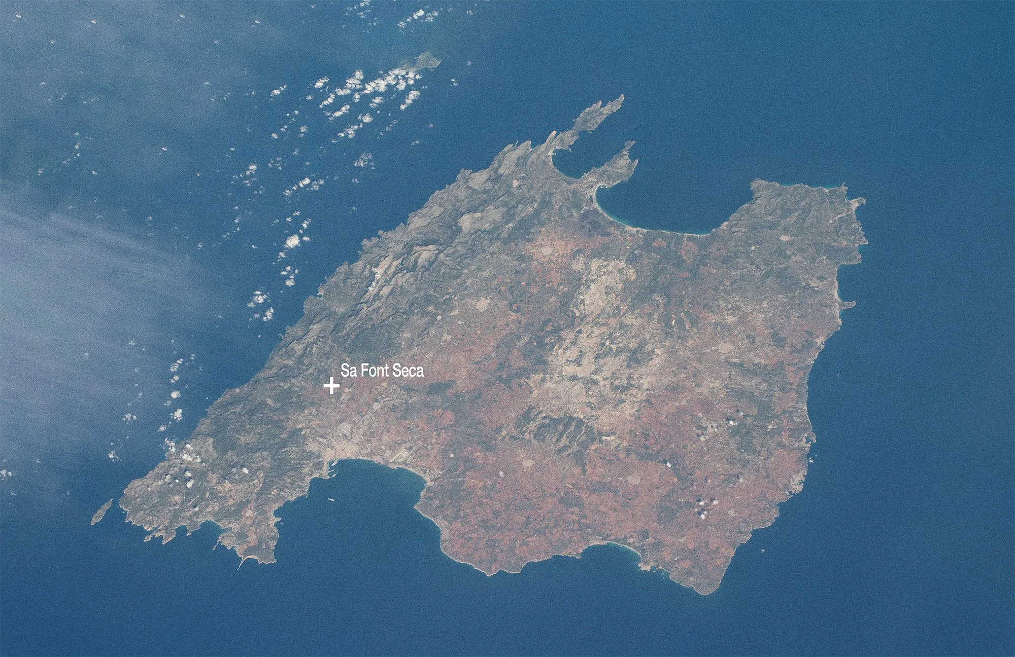 Satellite image of the island of Mallorca, Spain, with the city of Sa Font Seca marked.