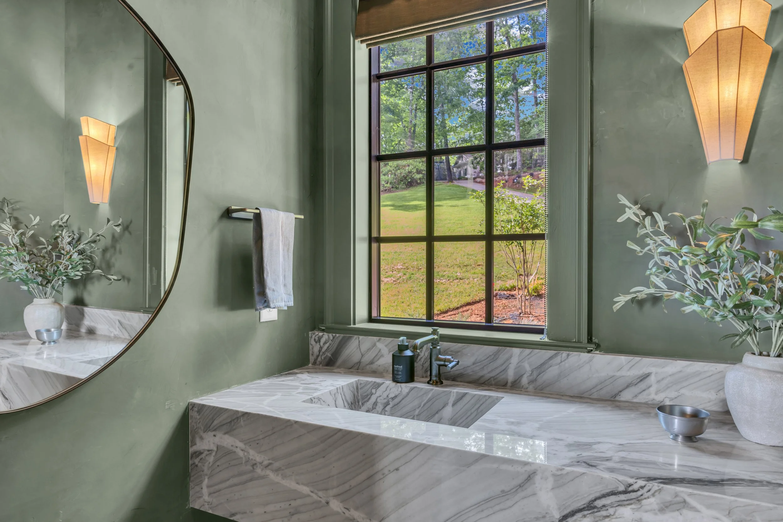 Designer Powder room with Statement Marble