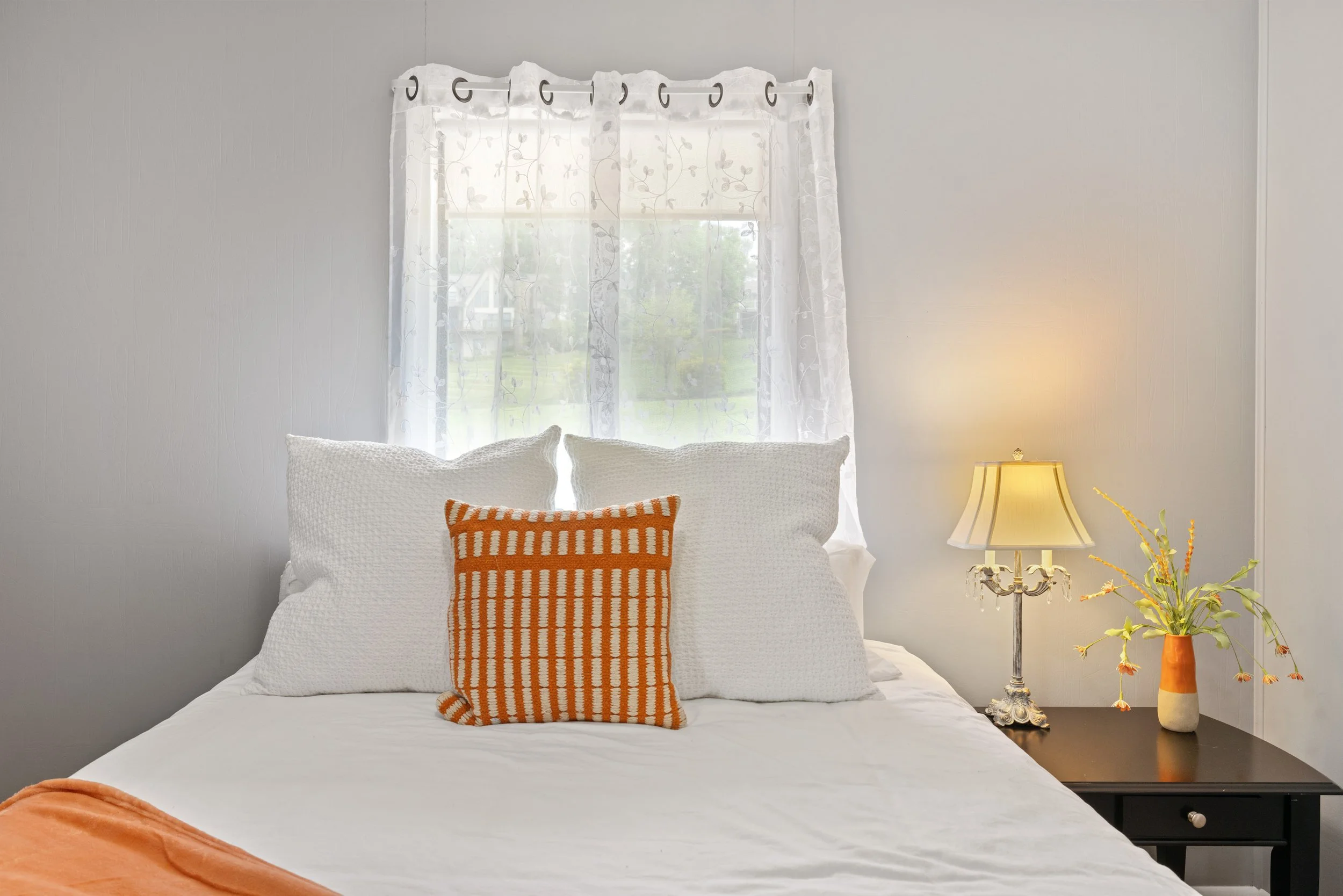 Pop of color in room decor for a VRBO Bedroom 