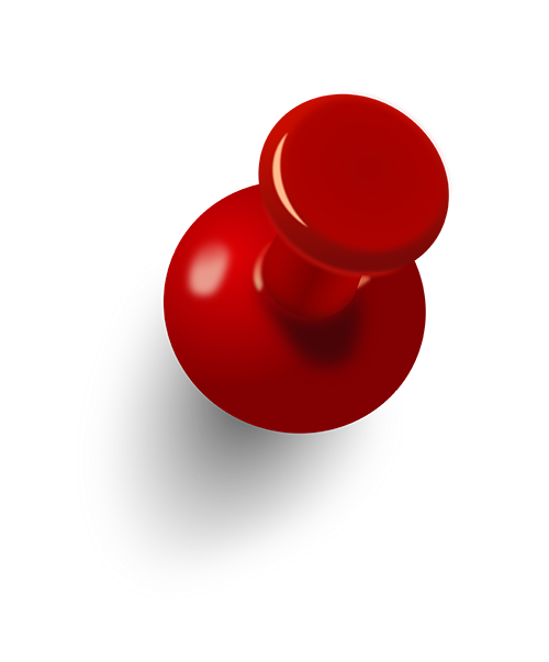 Red pushpin on a black surface.