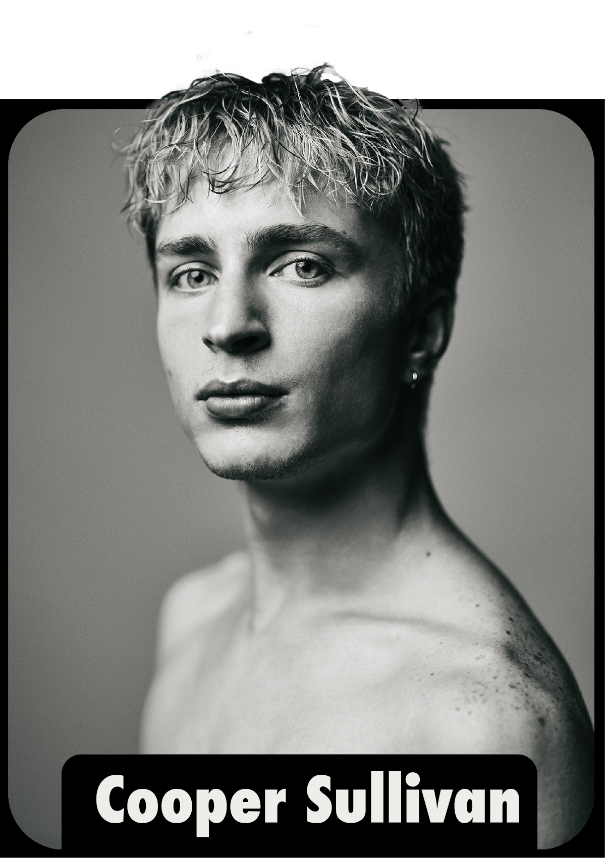 Black and white portrait of a young person with short, wavy hair, looking directly at the camera with a neutral expression. The person is shirtless, showing their shoulders and upper chest, with freckles visible on their skin. The text "Cooper Sullivan" is displayed at the bottom of the image.