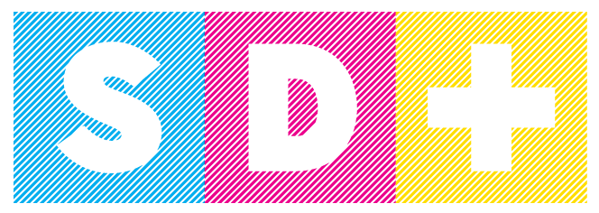 Colorful sign with blue 'S', pink 'D', and yellow '+' symbols.