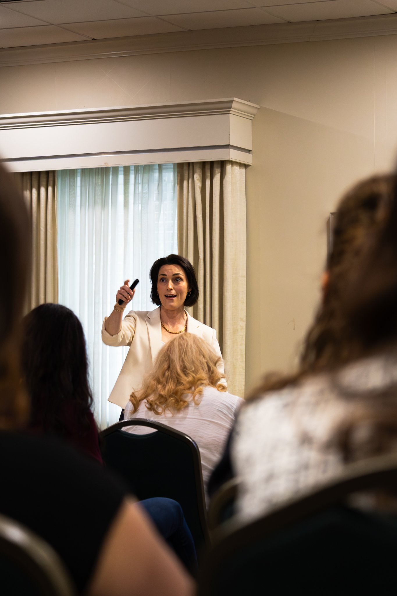 Woman Veteran Speaker Becca Spahr gives workshop to veteran-serving organizations to help them understand the unique challenges veterans and first responders face regarding social wellness and connection.