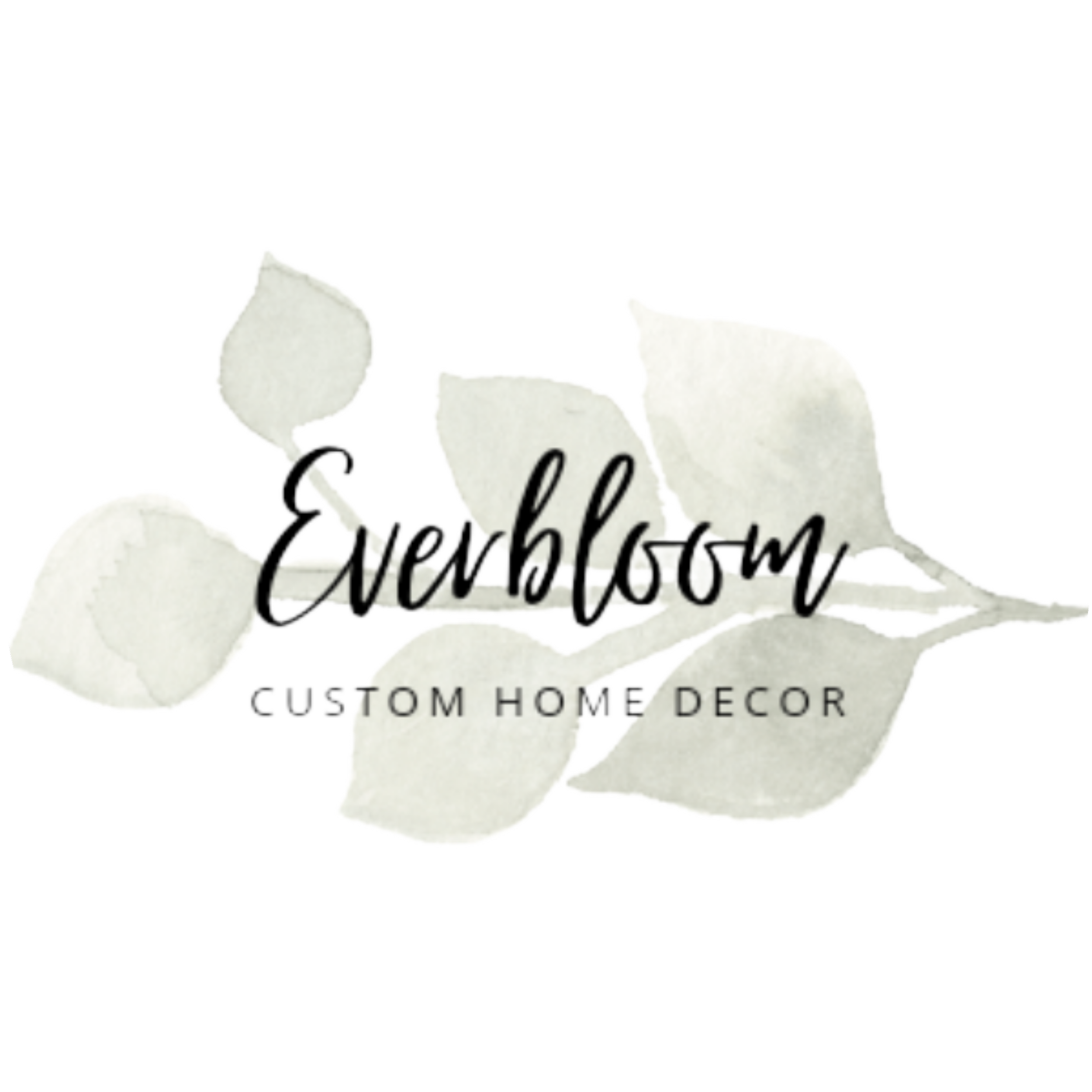 Close-up of a white decorative sign with black cursive lettering reading "Evelystra" and smaller print "Custom Home Decor" underneath, surrounded by three white pumpkin decorations.