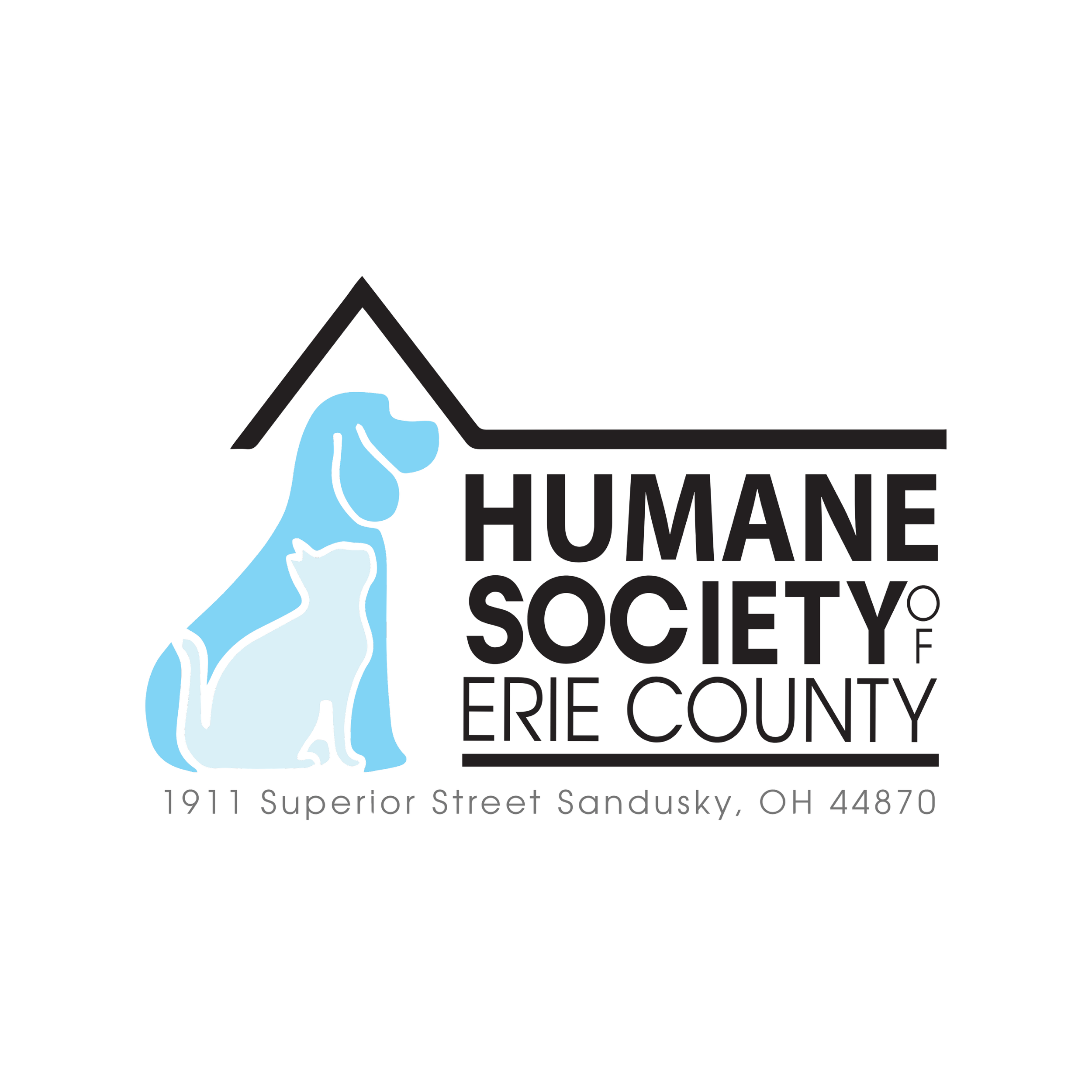A sign for the Humane Society of Erie County in Sandusky, Ohio, with a cartoon dog illustration and office hours.