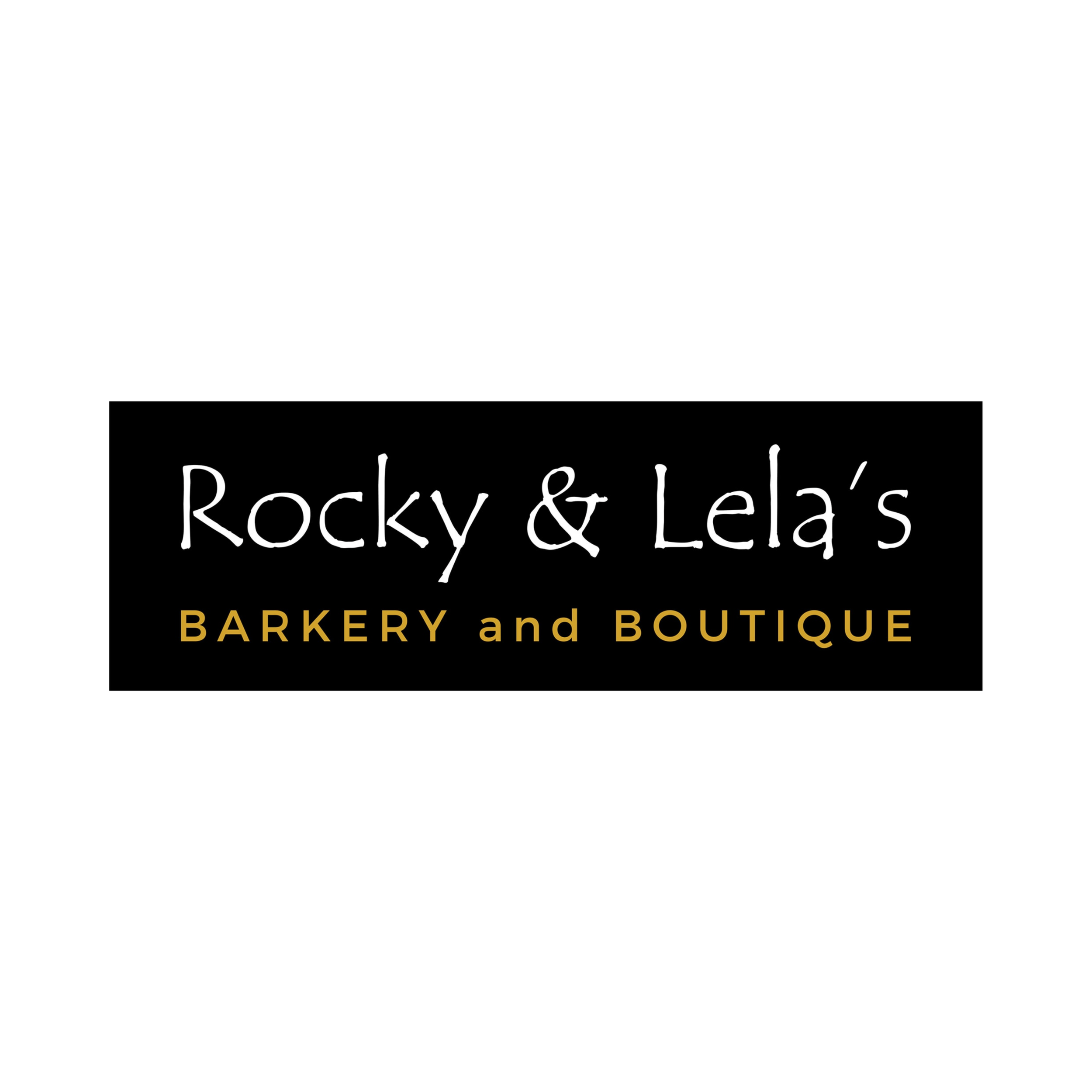 Black sign with white and yellow text that reads 'Rocky & Lee's BARKERY and BOUTIQUE'