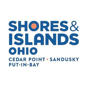 Logo of Shores & Islands Ohio featuring blue text highlighting Cedar Point, Sandusky, and Put-In-Bay.
