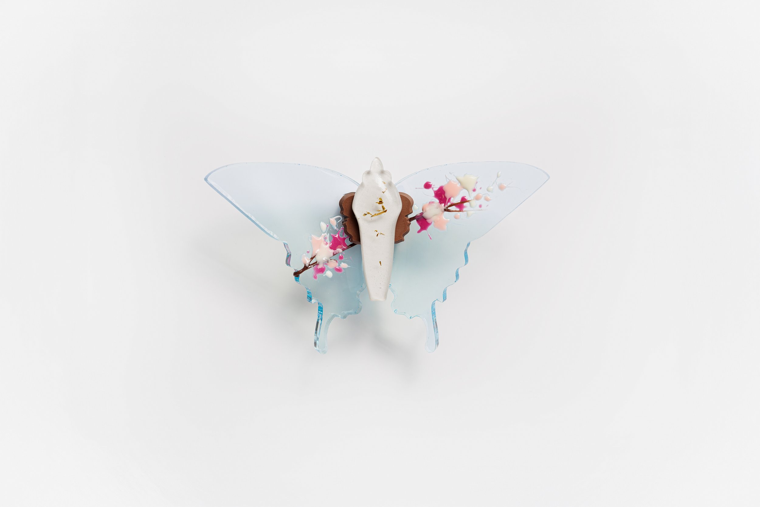 Miniature blue soft resin butterfly art featuring cherry blossoms representing the community affected by the Washington, D.C. mass shooting