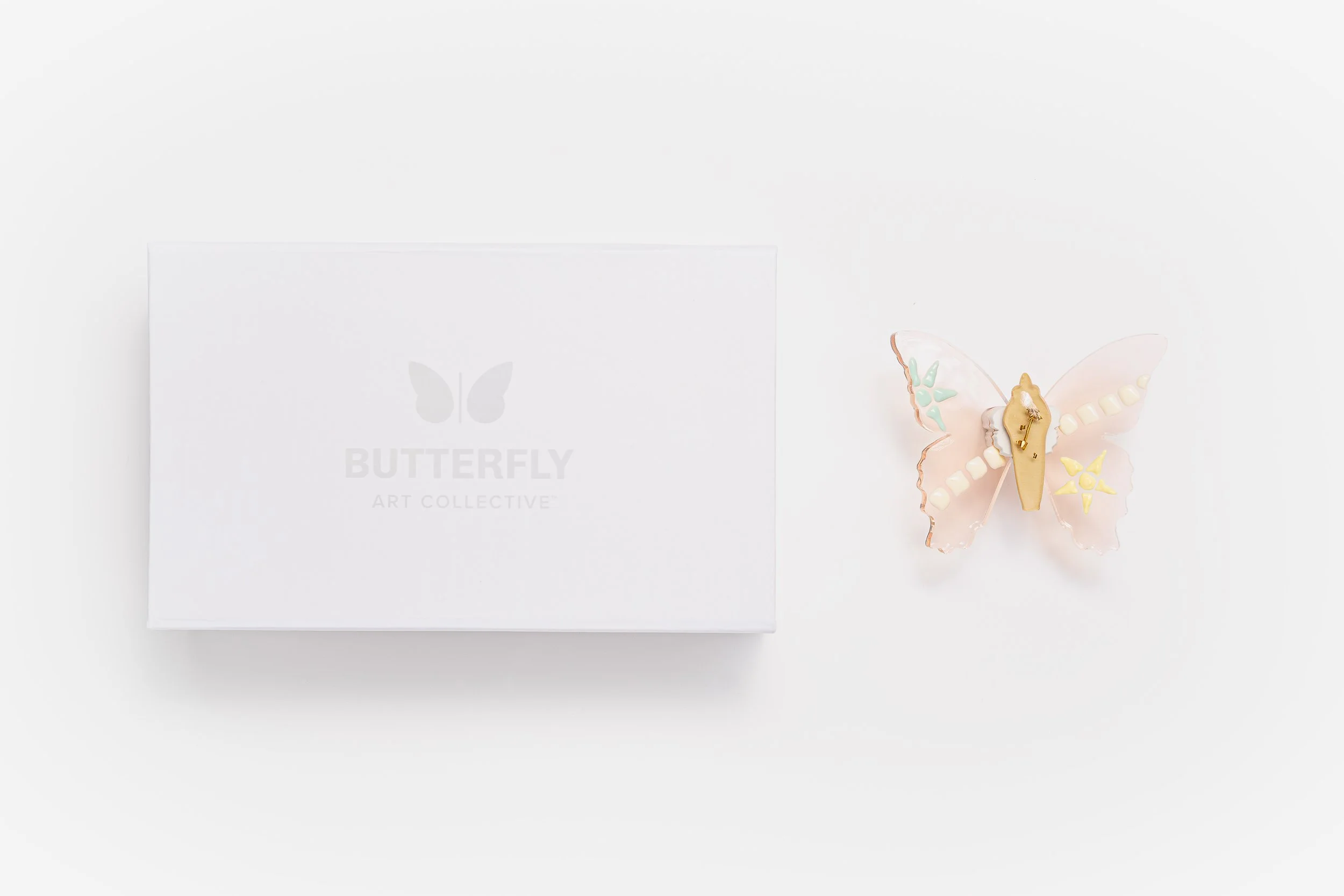 Miniature soft resin butterfly art featuring mosaic tiles representing the community affected by the Robb Elementary School mass shooting in Uvalde, TX