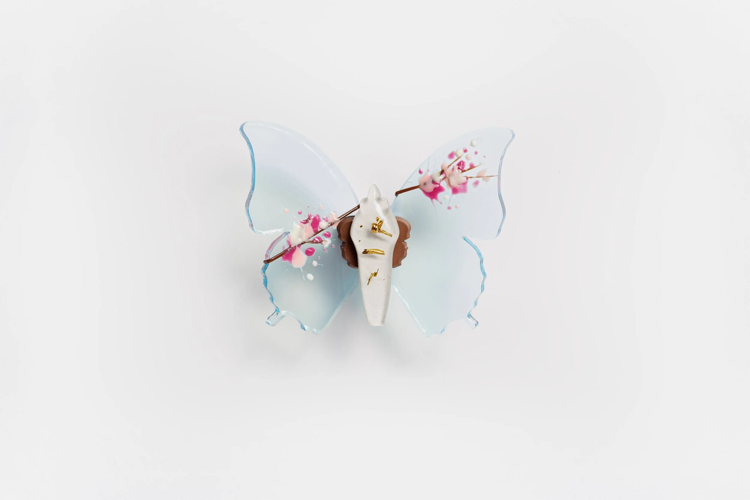 Miniature blue soft resin butterfly art featuring cherry blossoms representing the community affected by the Washington, D.C. mass shooting