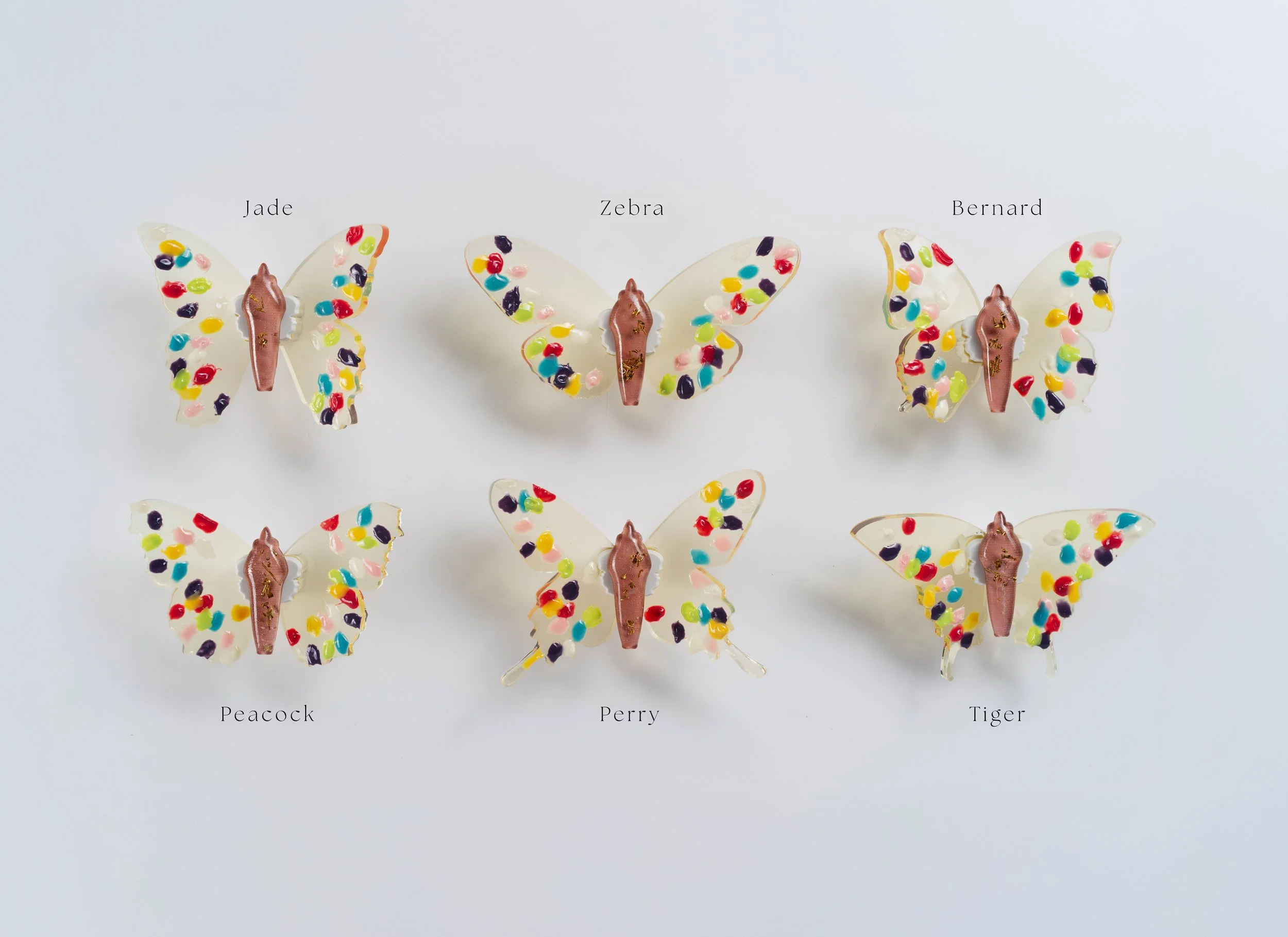 Miniature yellow soft resin butterfly art featuring fingerprints representing the community affected by the Sandy Hook Elementary School mass shooting in Newtown, CT