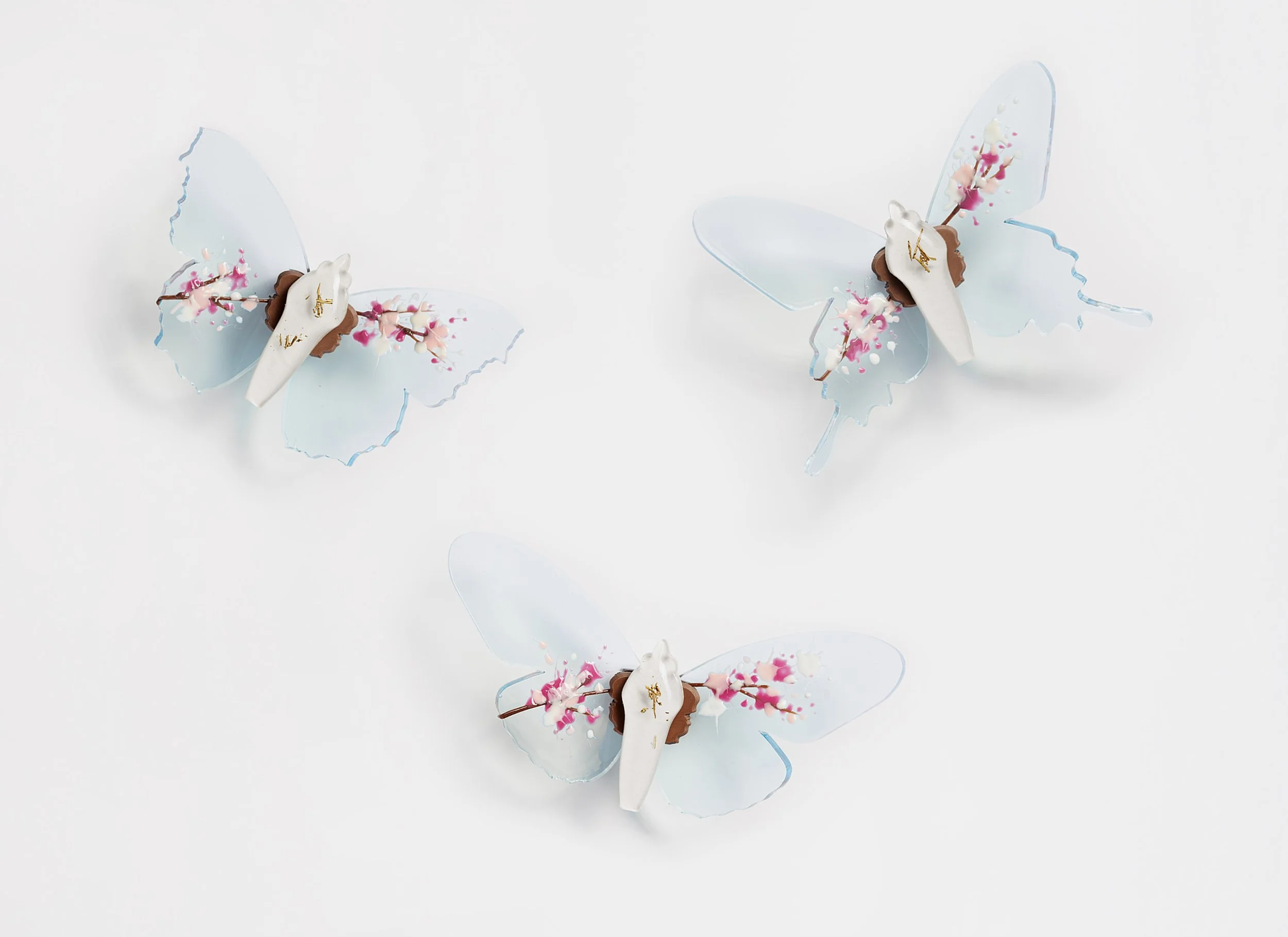 Miniature blue soft resin butterfly art featuring cherry blossoms representing the community affected by the Washington, D.C. mass shooting