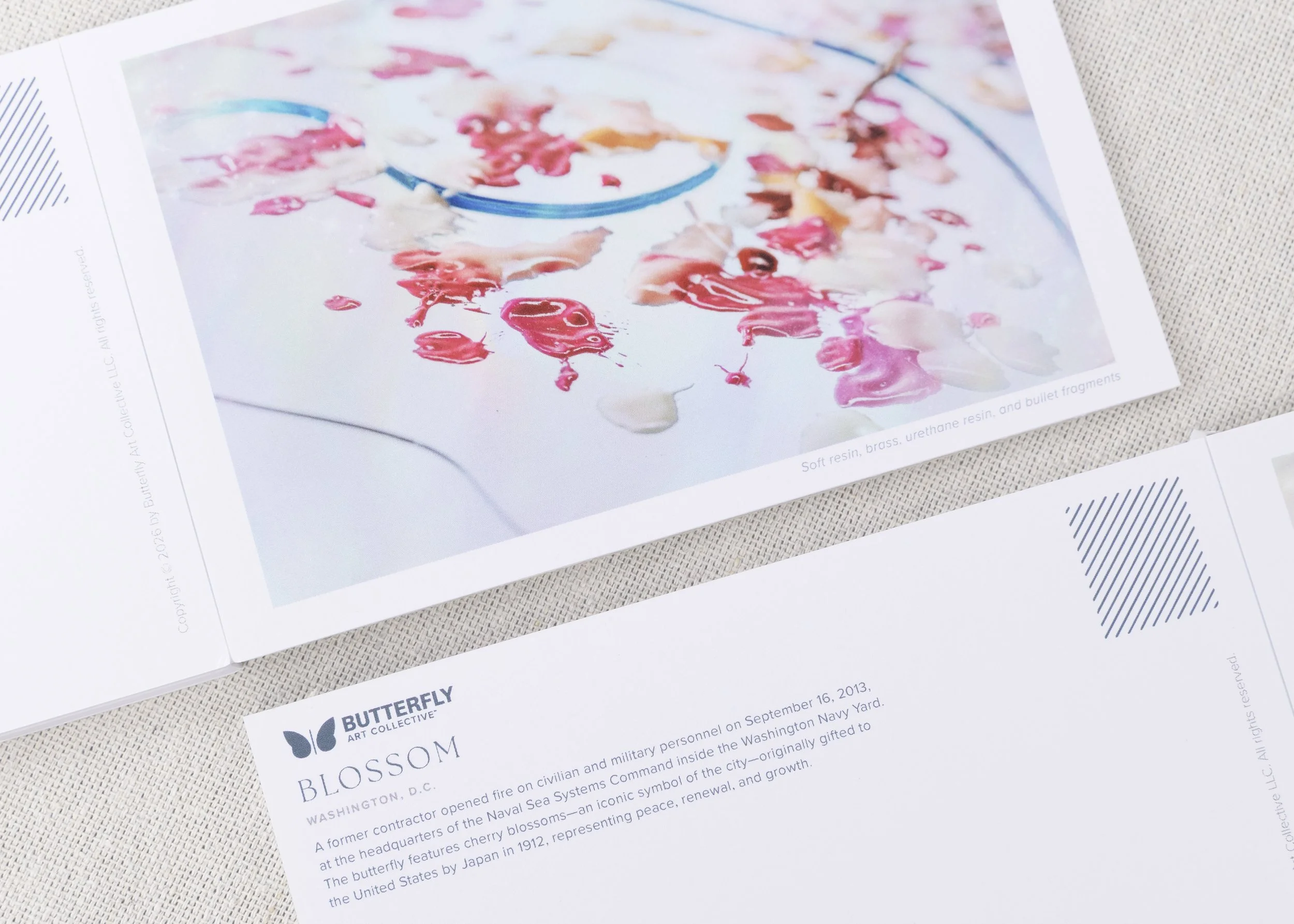Blossom art postcard featuring cherry blossom butterfly-inspired artwork alongside the story of the sculpture's inspiration.