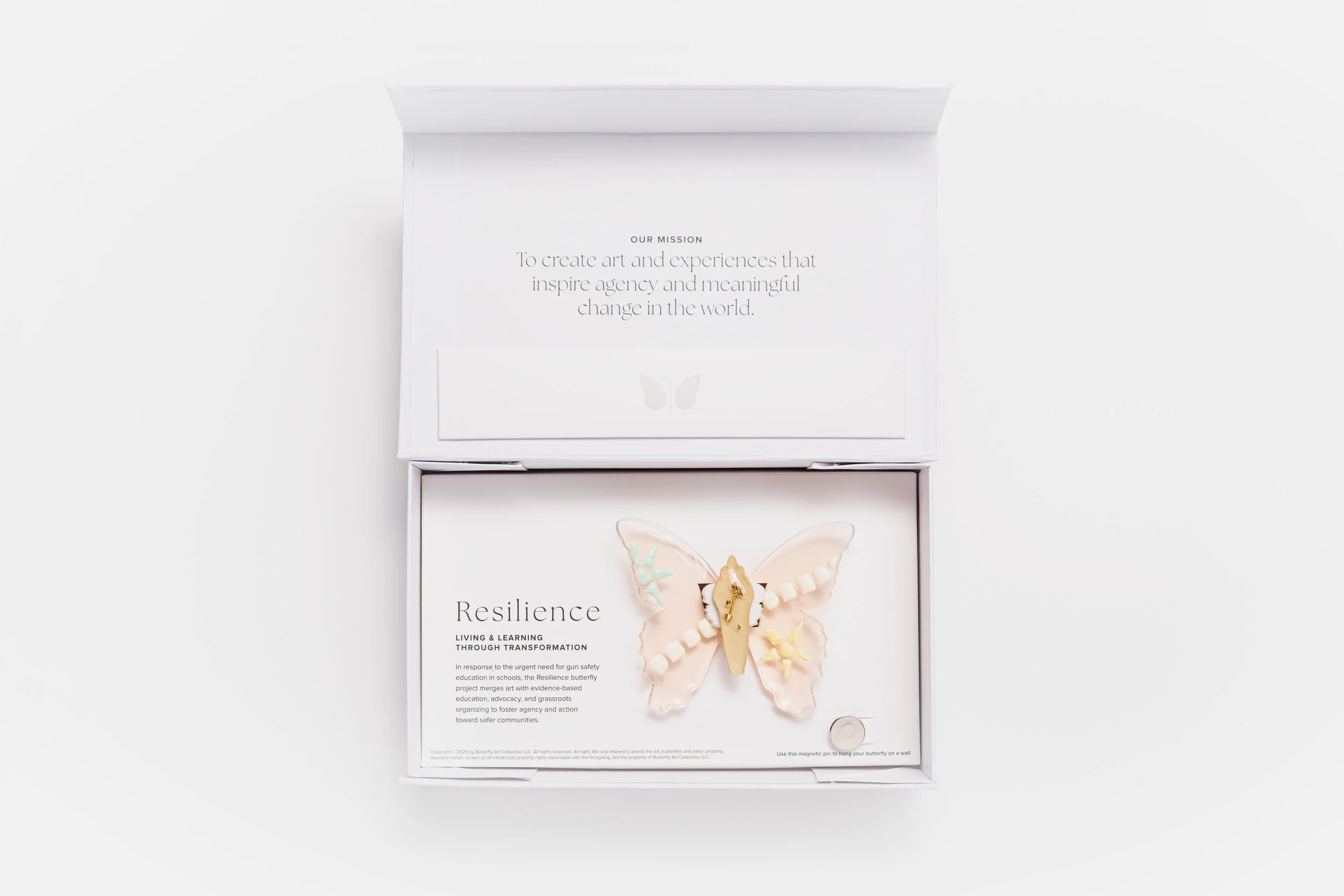 Miniature soft resin butterfly art featuring mosaic tiles representing the community affected by the Robb Elementary School mass shooting in Uvalde, TX