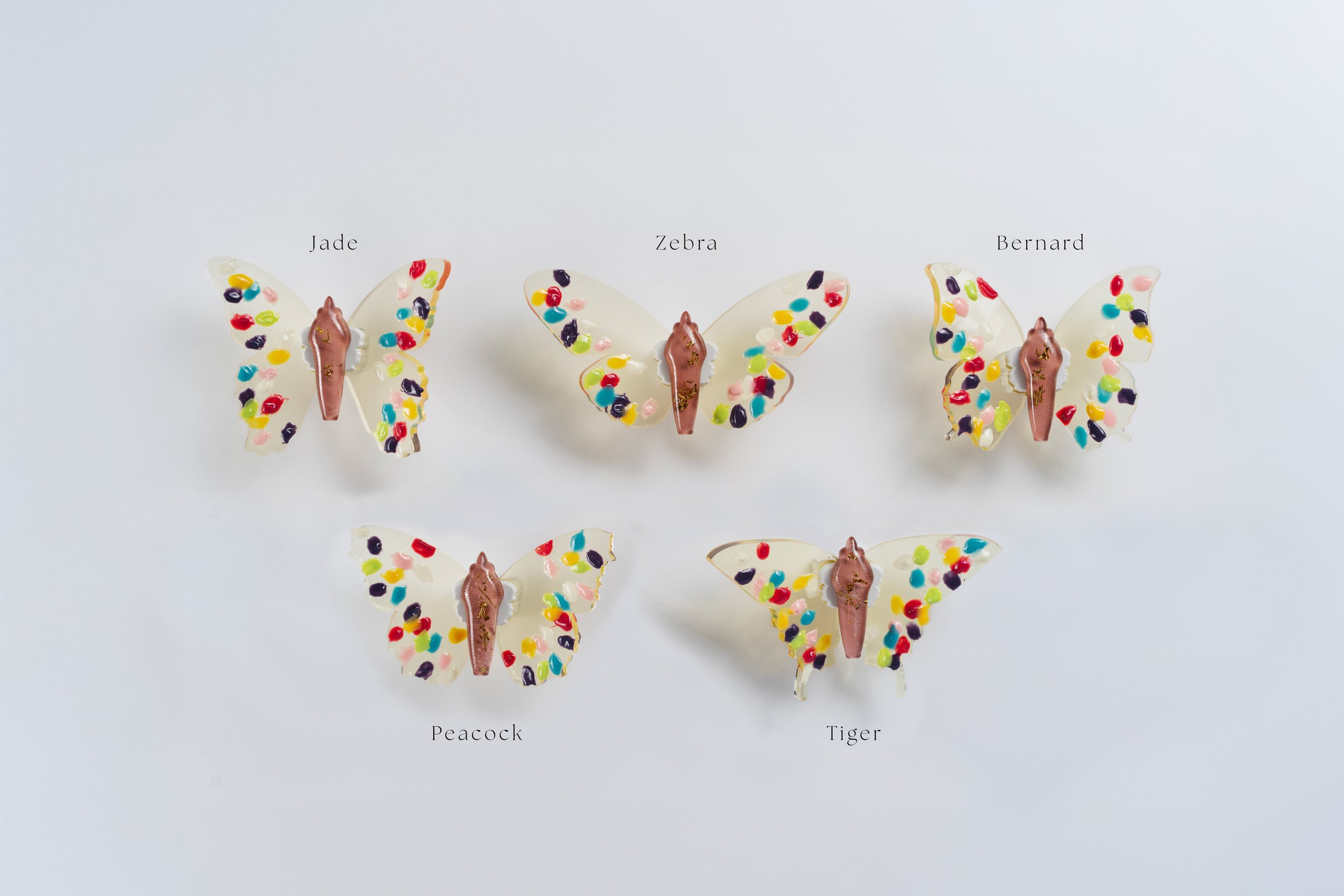 Miniature yellow soft resin butterfly art featuring fingerprints representing the community affected by the Sandy Hook Elementary School mass shooting in Newtown, CT