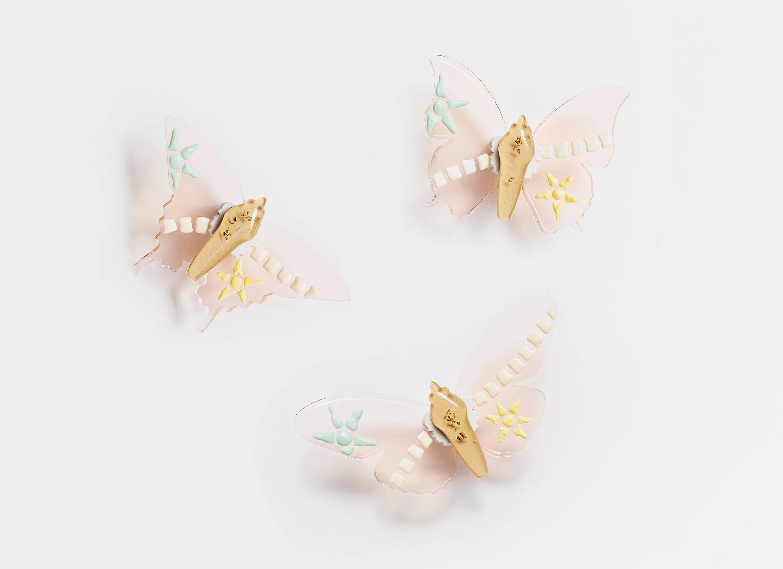 Miniature soft resin butterfly art featuring mosaic tiles representing the community affected by the Robb Elementary School mass shooting in Uvalde, TX