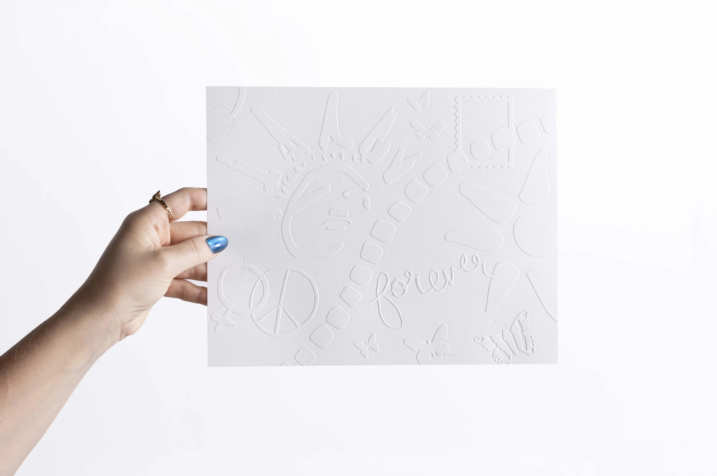 White embossed watercolor paper artwork featuring butterflies, and various other icons from the Butterfly Art Collective's Butterflies.