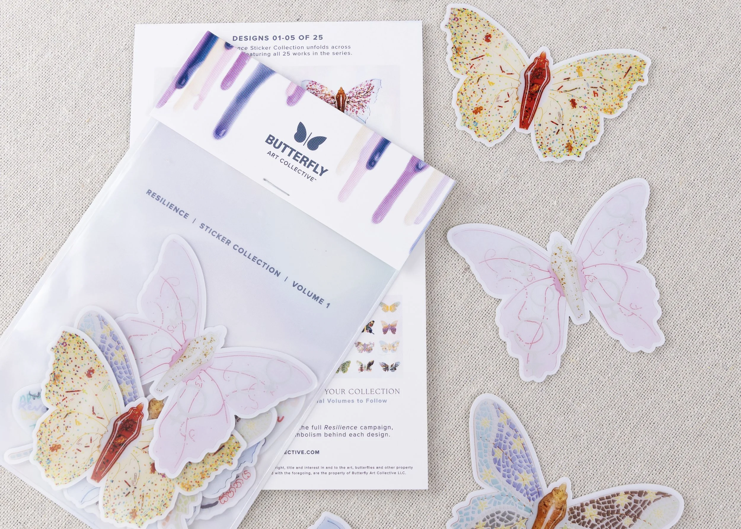 Resilience Sticker Collection displayed with its packaging and individual butterfly-shaped vinyl stickers by Butterfly Art Collective.