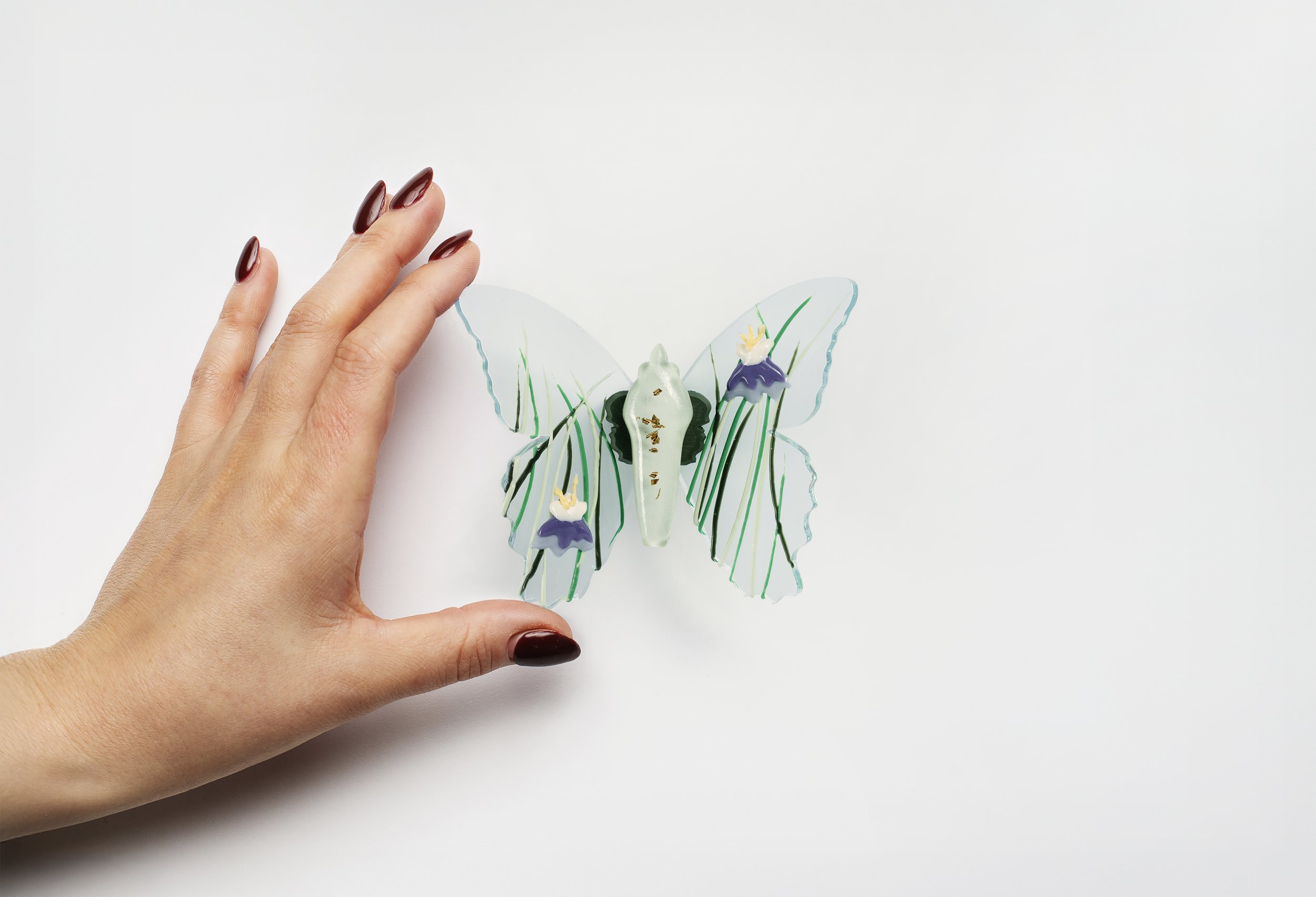 Miniature soft resin butterfly art representing the community affected by the Columbine High School mass shooting in Littleton, CO