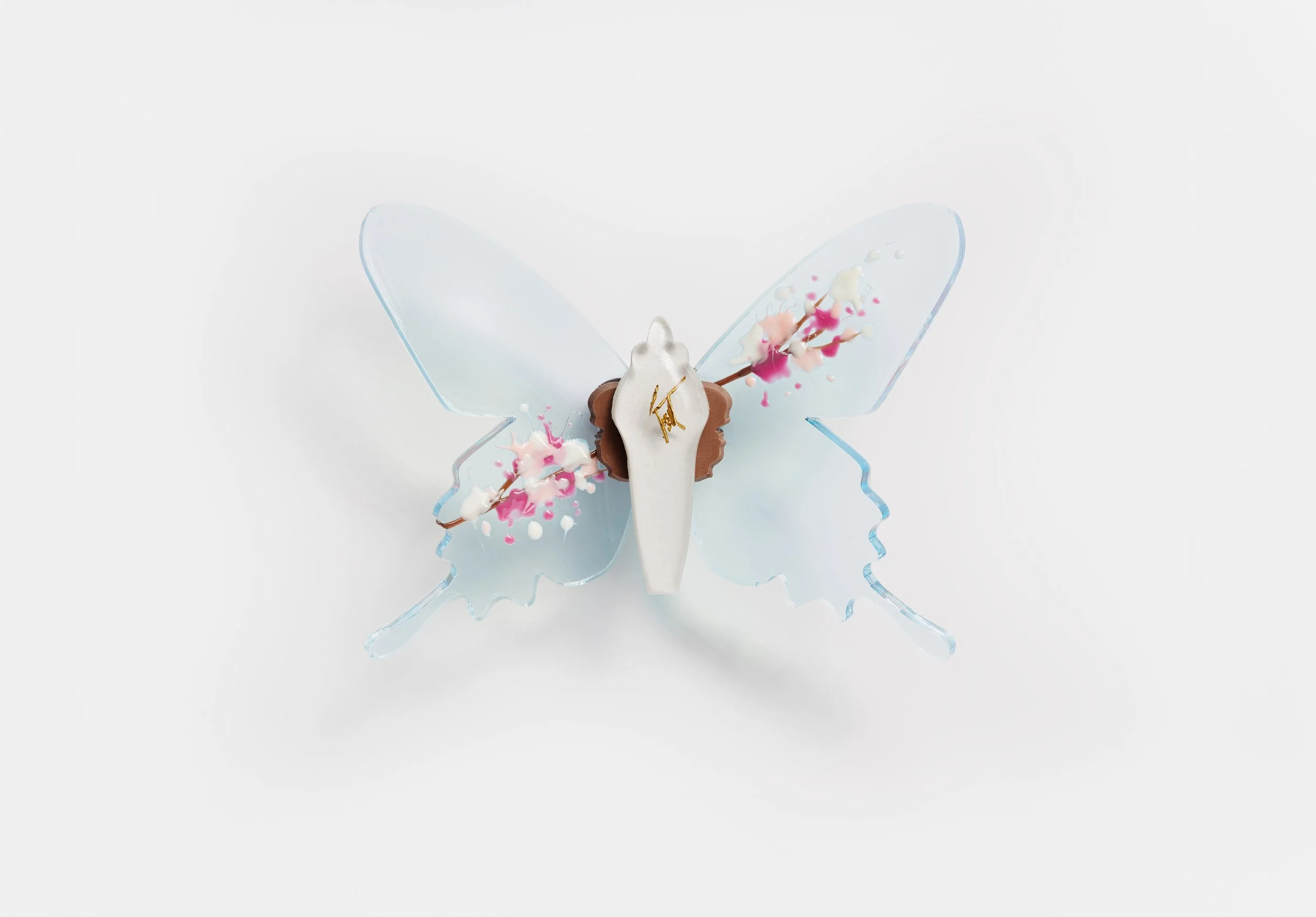 Miniature blue soft resin butterfly art featuring cherry blossoms representing the community affected by the Washington, D.C. mass shooting