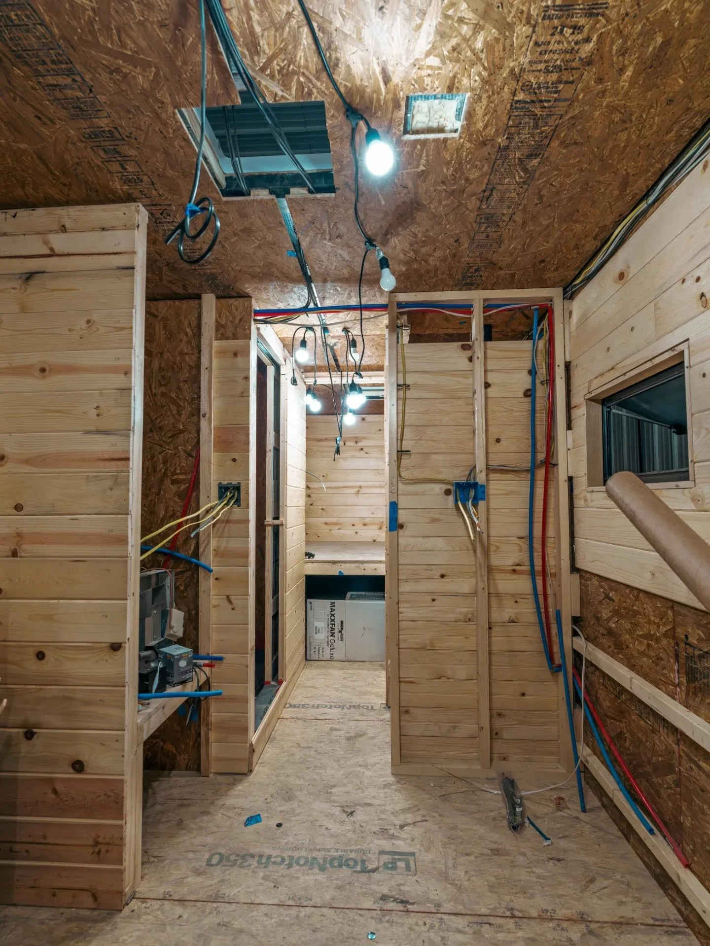 Interior construction progress on our tiny home on wheels- a 1997 Stewart and Stevenson 6x6 expedition vehicle. More photos to come, follow along!

1- from the dinette looking toward the hallway. rough plumbing and electrical lines.
2- from the hallw