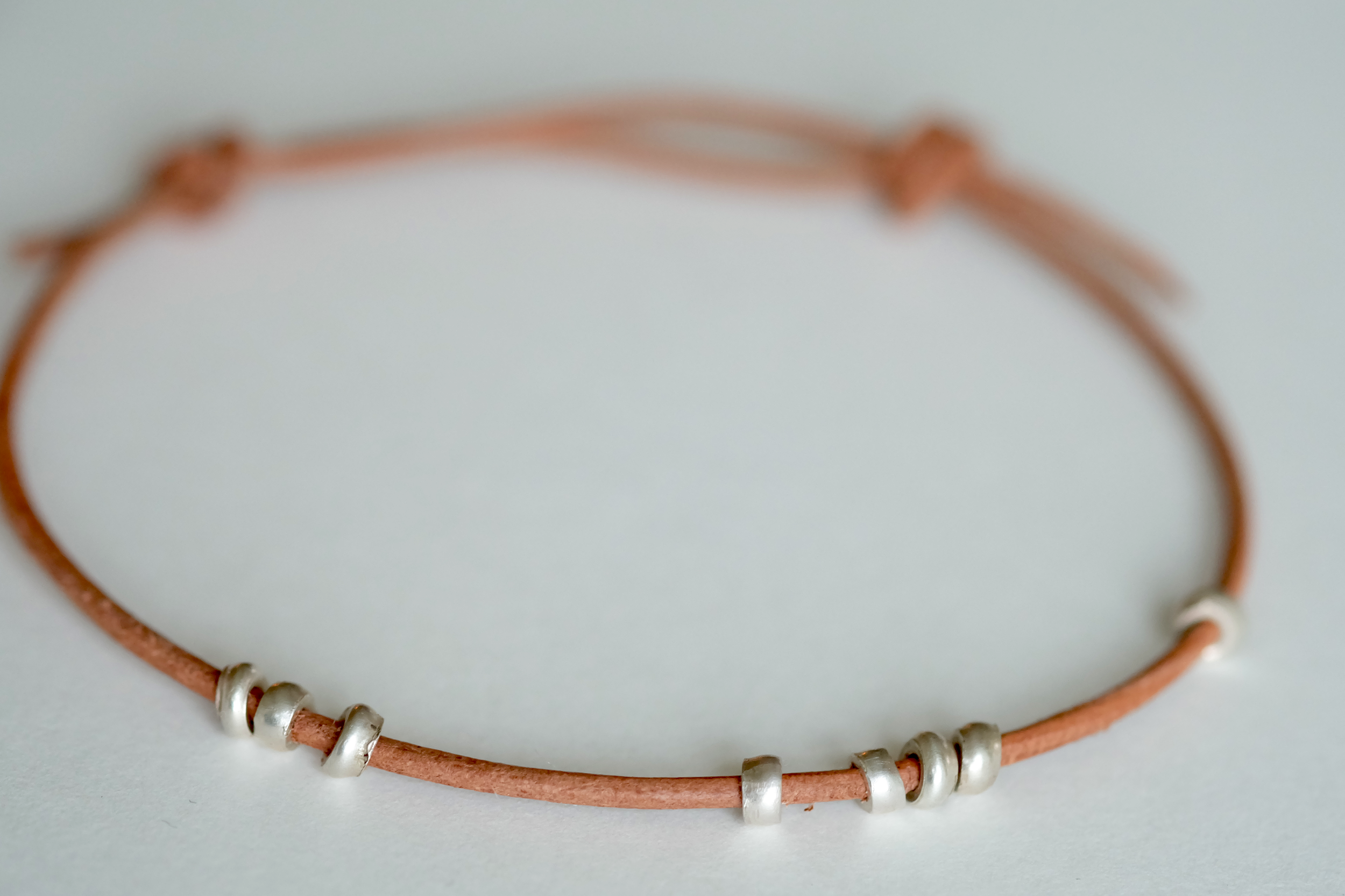 56) tribal tribute . bracelet . silver & leather . adjustable in size . dkk 330