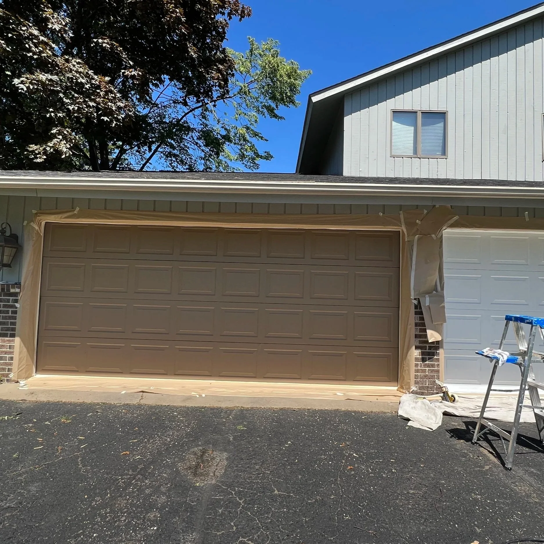 Is Garage Door Restoration Cheaper Than Replacement?
