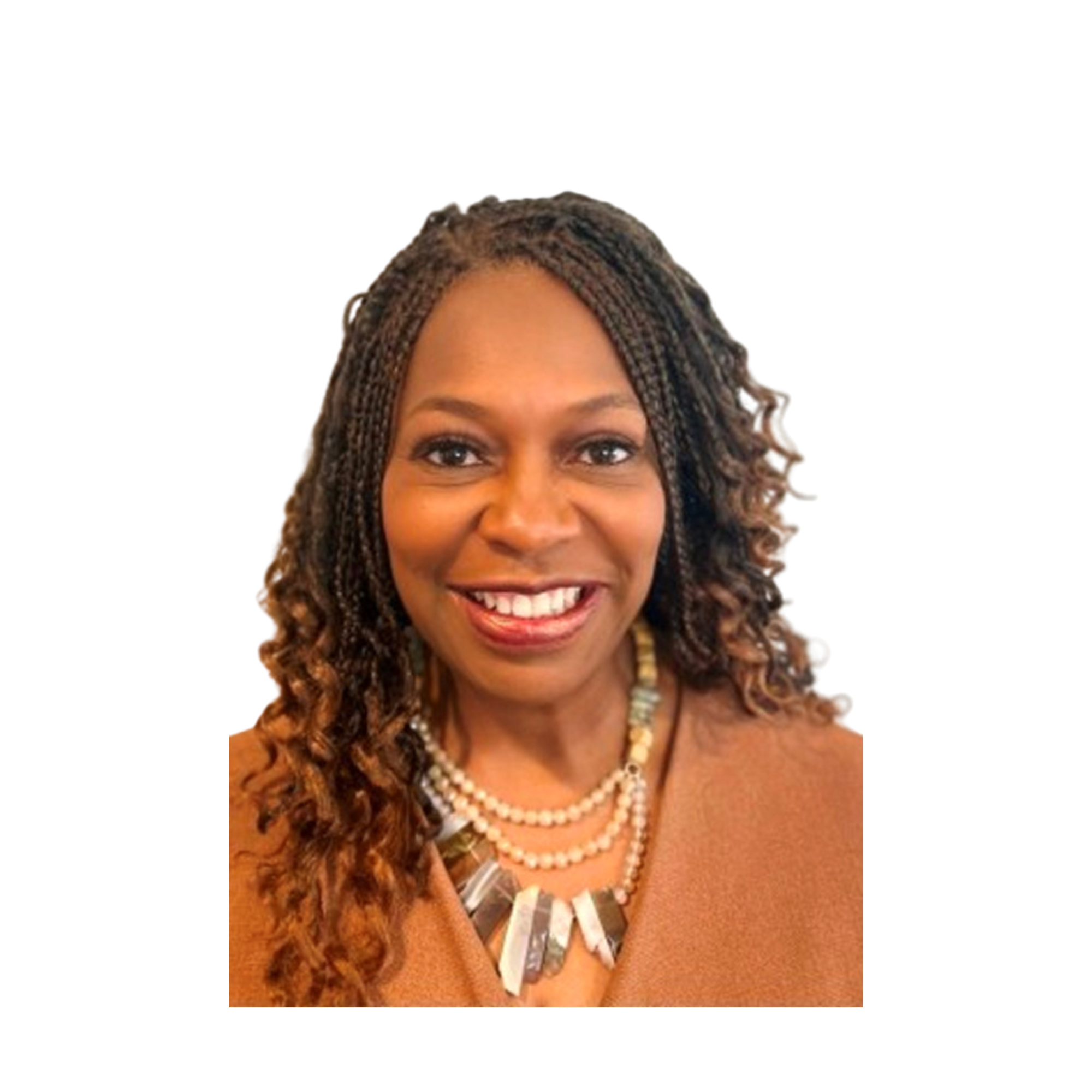 Smiling woman with braided hair, wearing a beige top and layered necklace, against a white background.