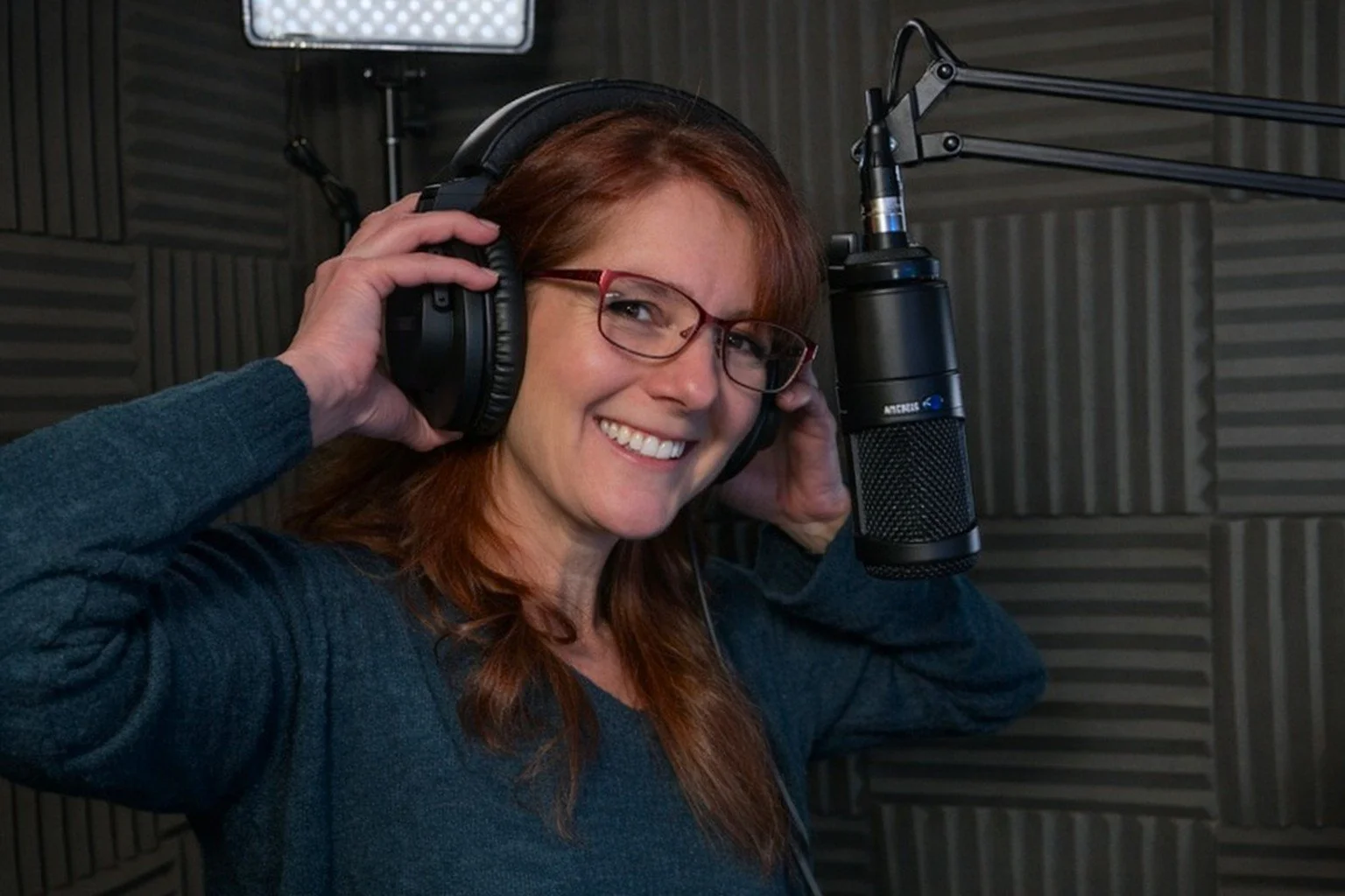 female voice over artist in studio