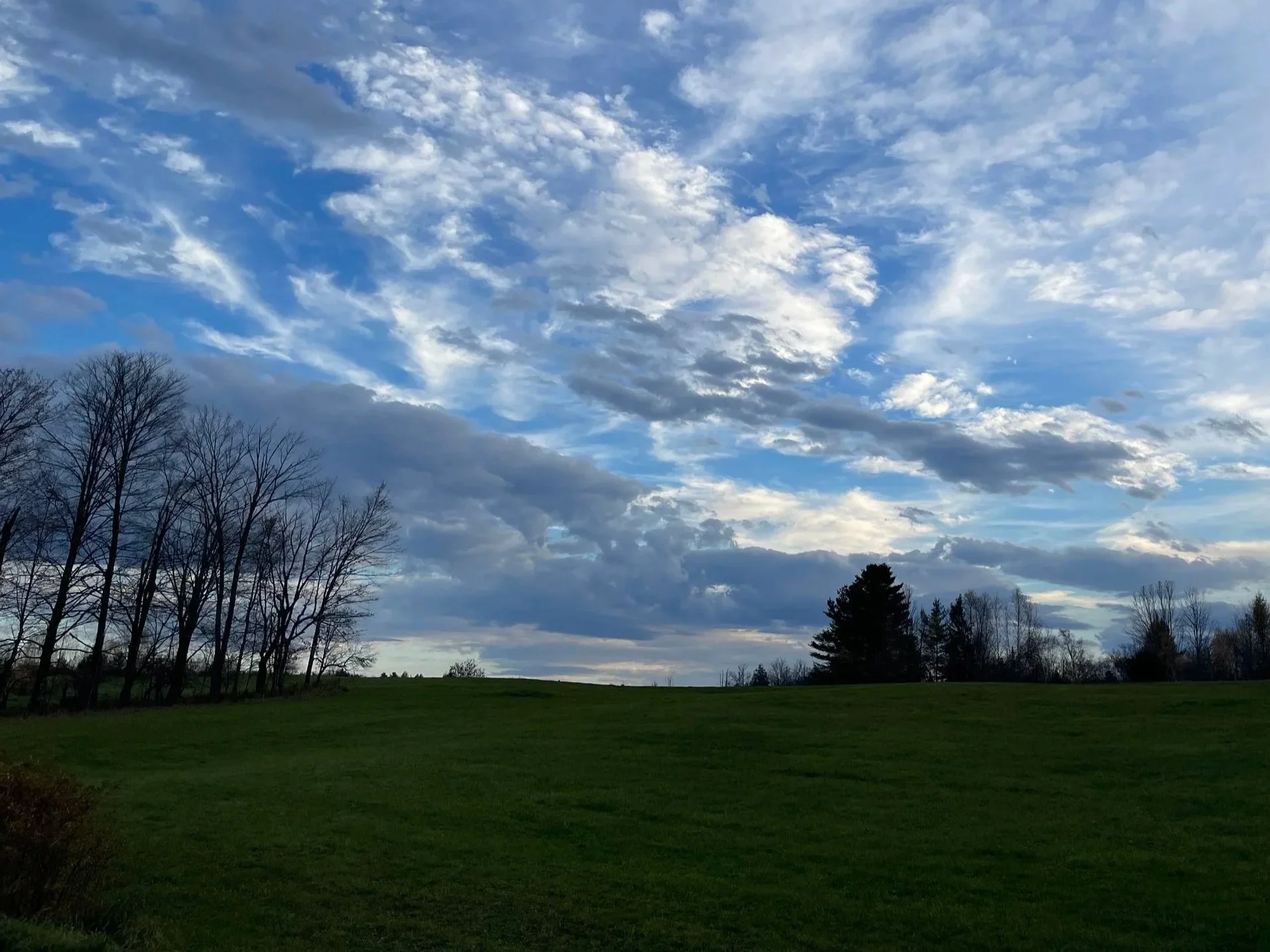 Late afternoon sky with clouds in northern Vermont, taken by Audrey Kiely, couple and individual therapist