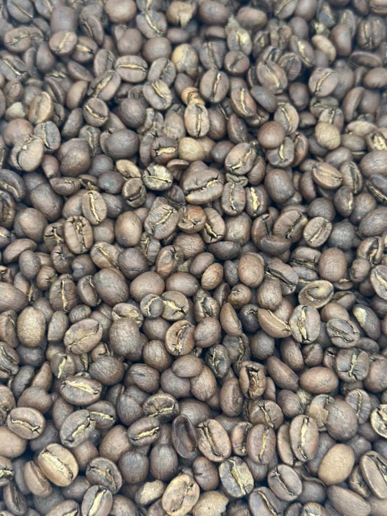 Why Your Coffee Tastes Like Sadness (And How Fresh Roasting Fixes Everything)